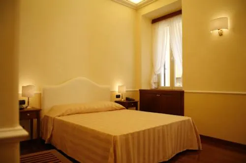 Bed in Luxury Ludovisi Rooms