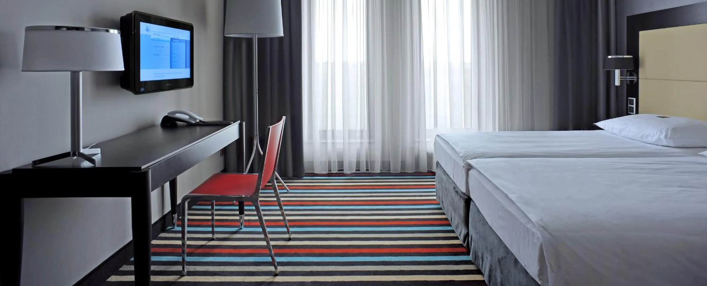 Bed in Silver Hotel & Gokart Center