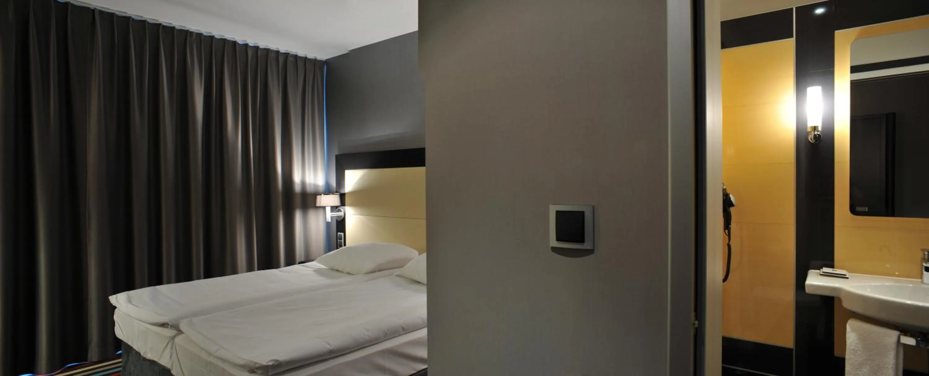 Bed in Silver Hotel & Gokart Center