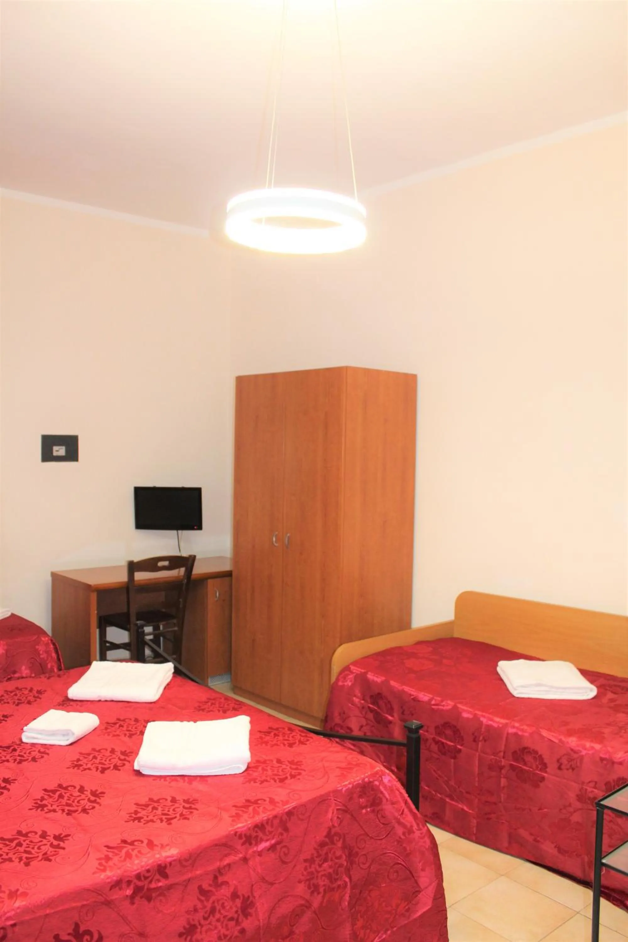 Bed in Hotel Eurorooms