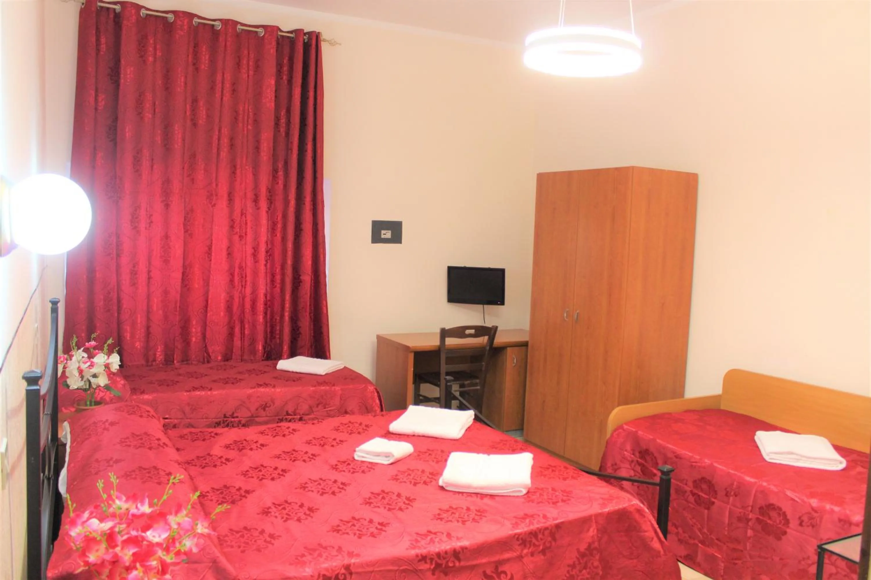 Bed in Hotel Eurorooms