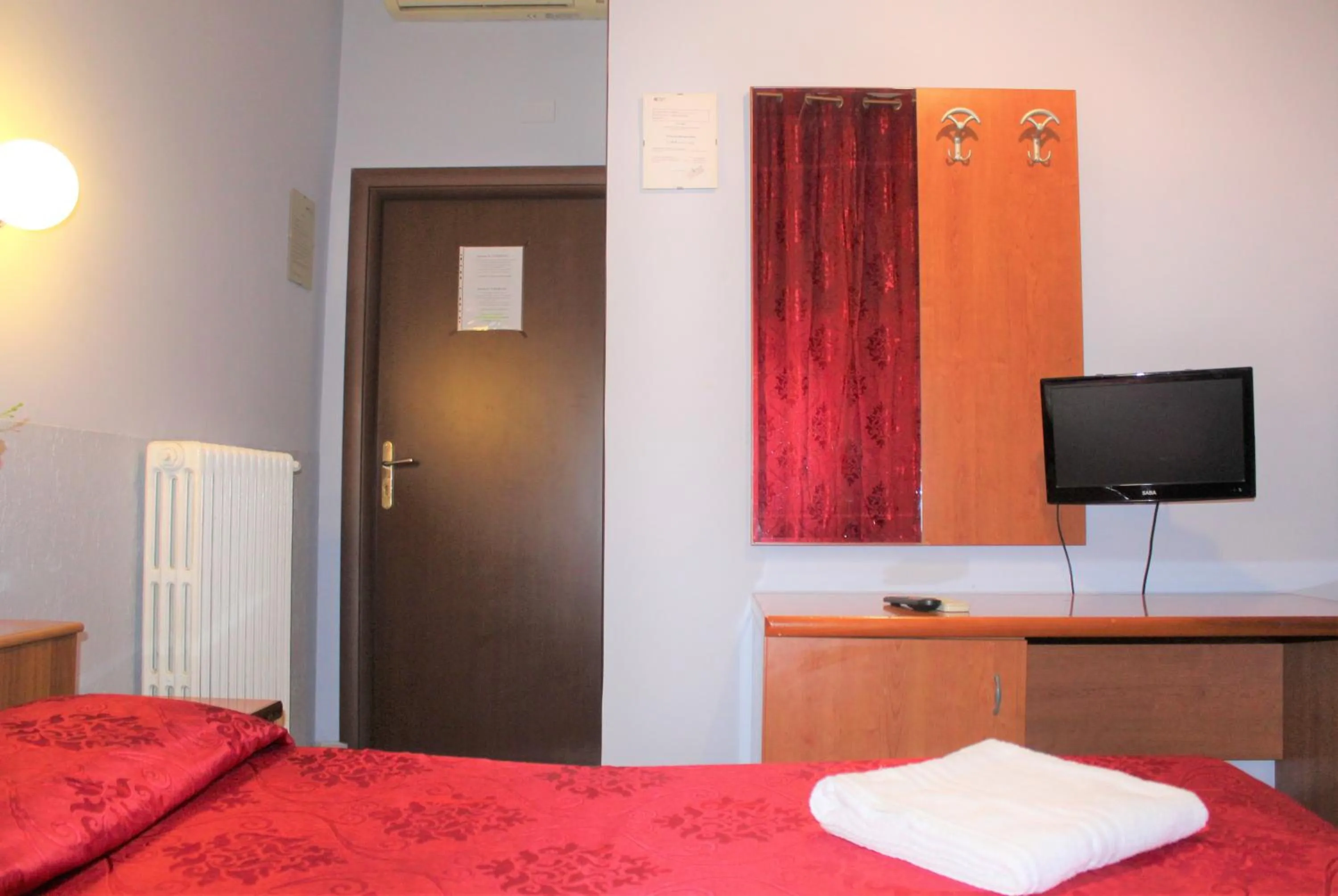 Bed in Hotel Eurorooms