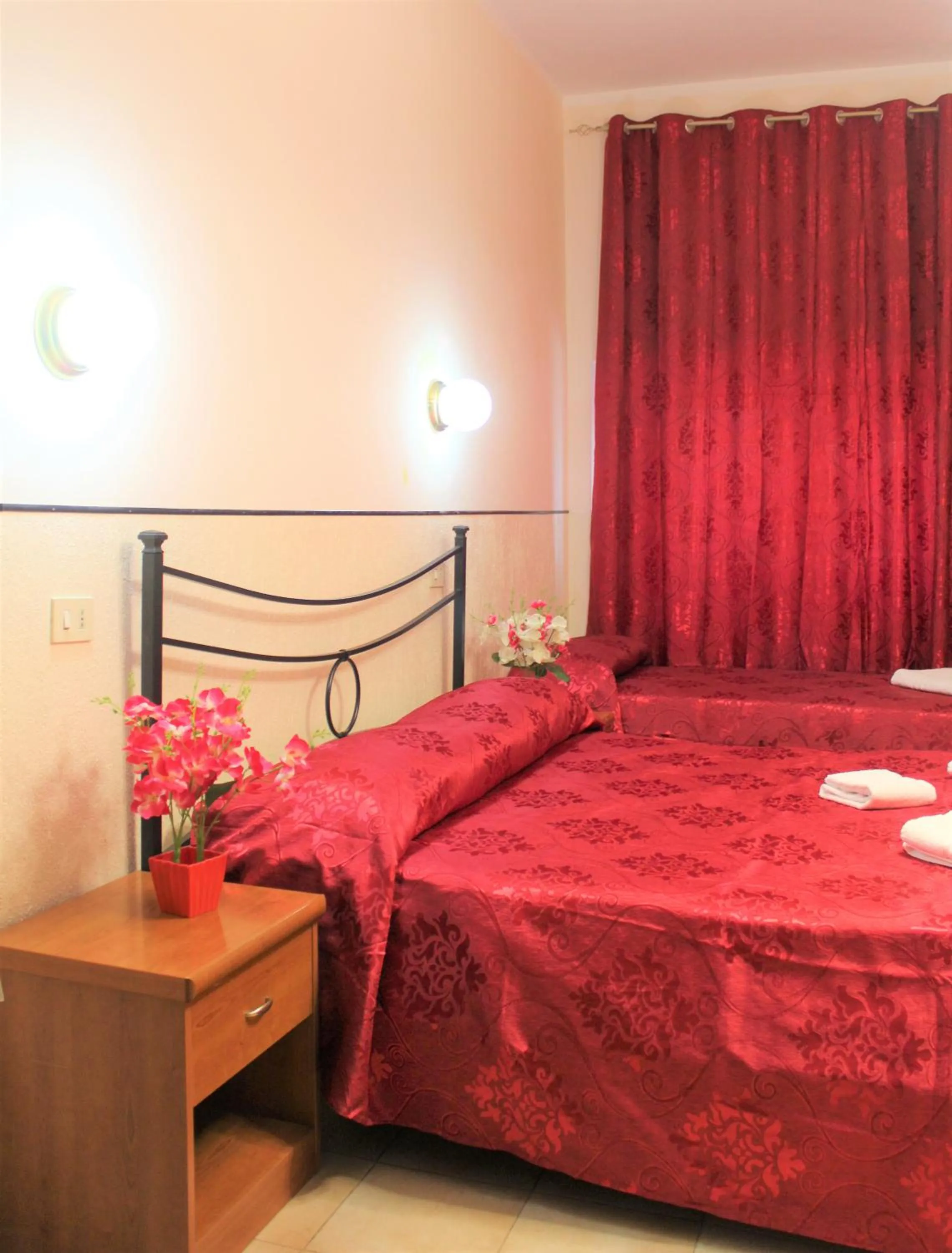 Bed in Hotel Eurorooms