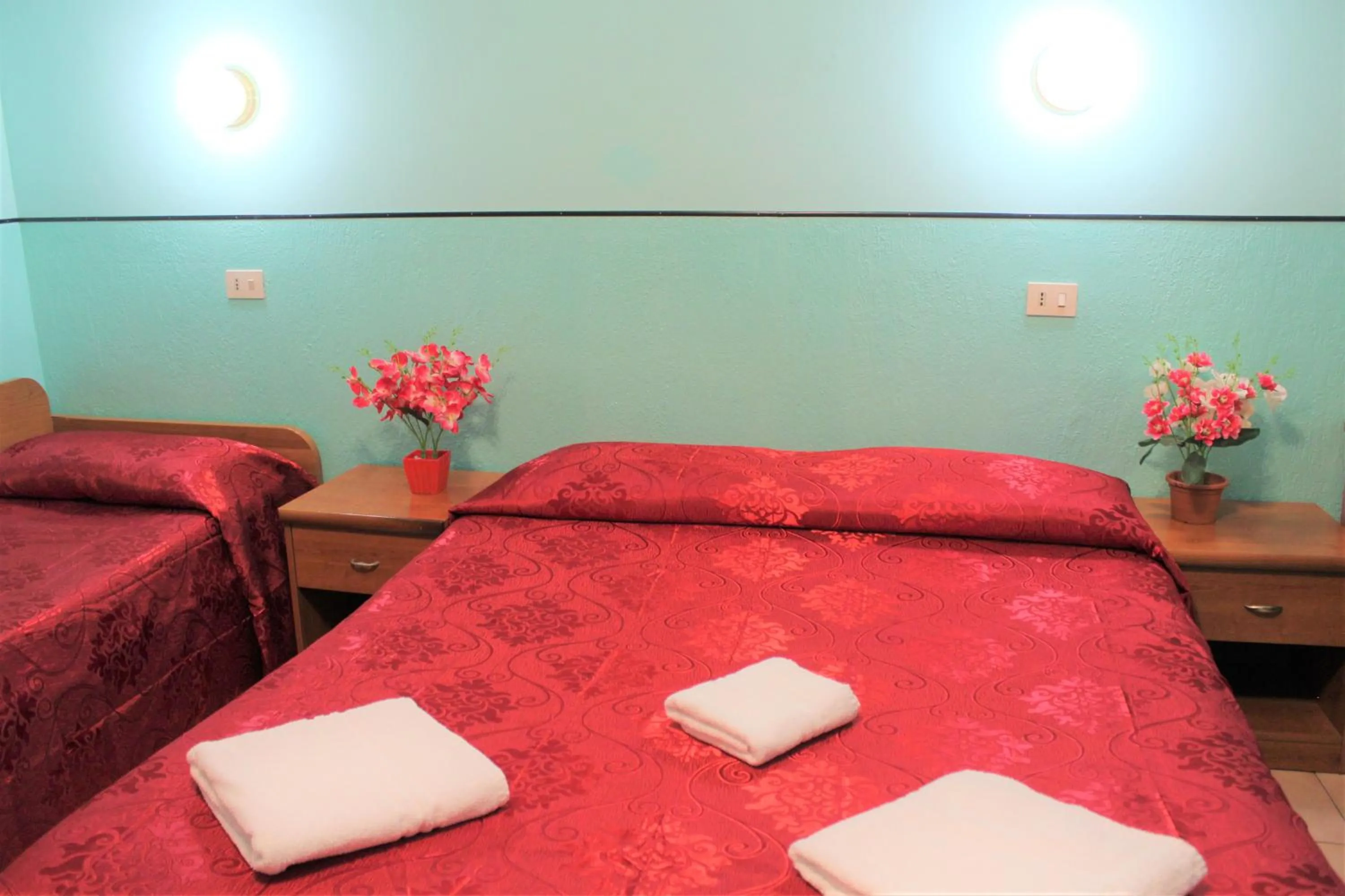 Bed in Hotel Eurorooms