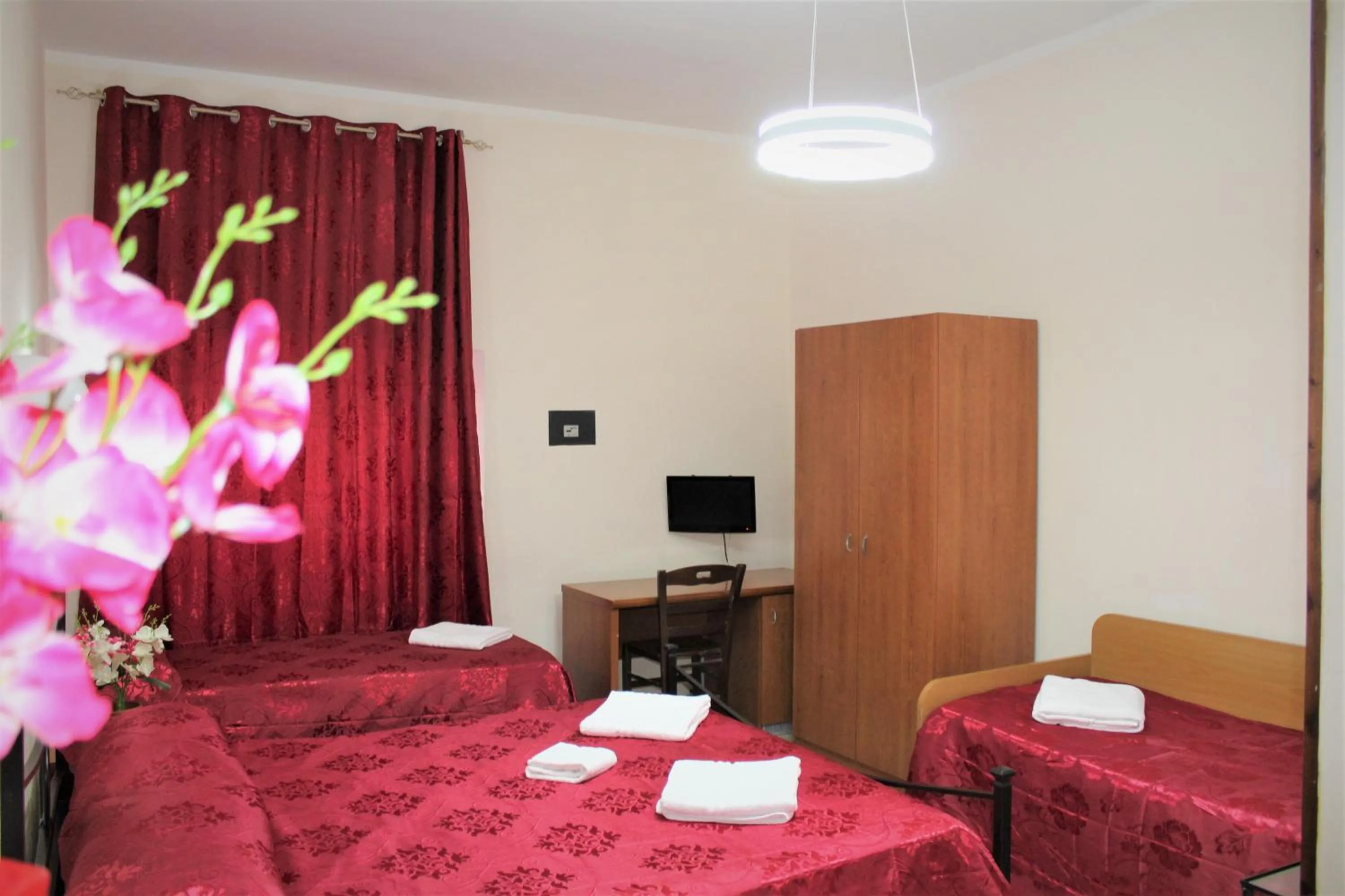 Bed in Hotel Eurorooms