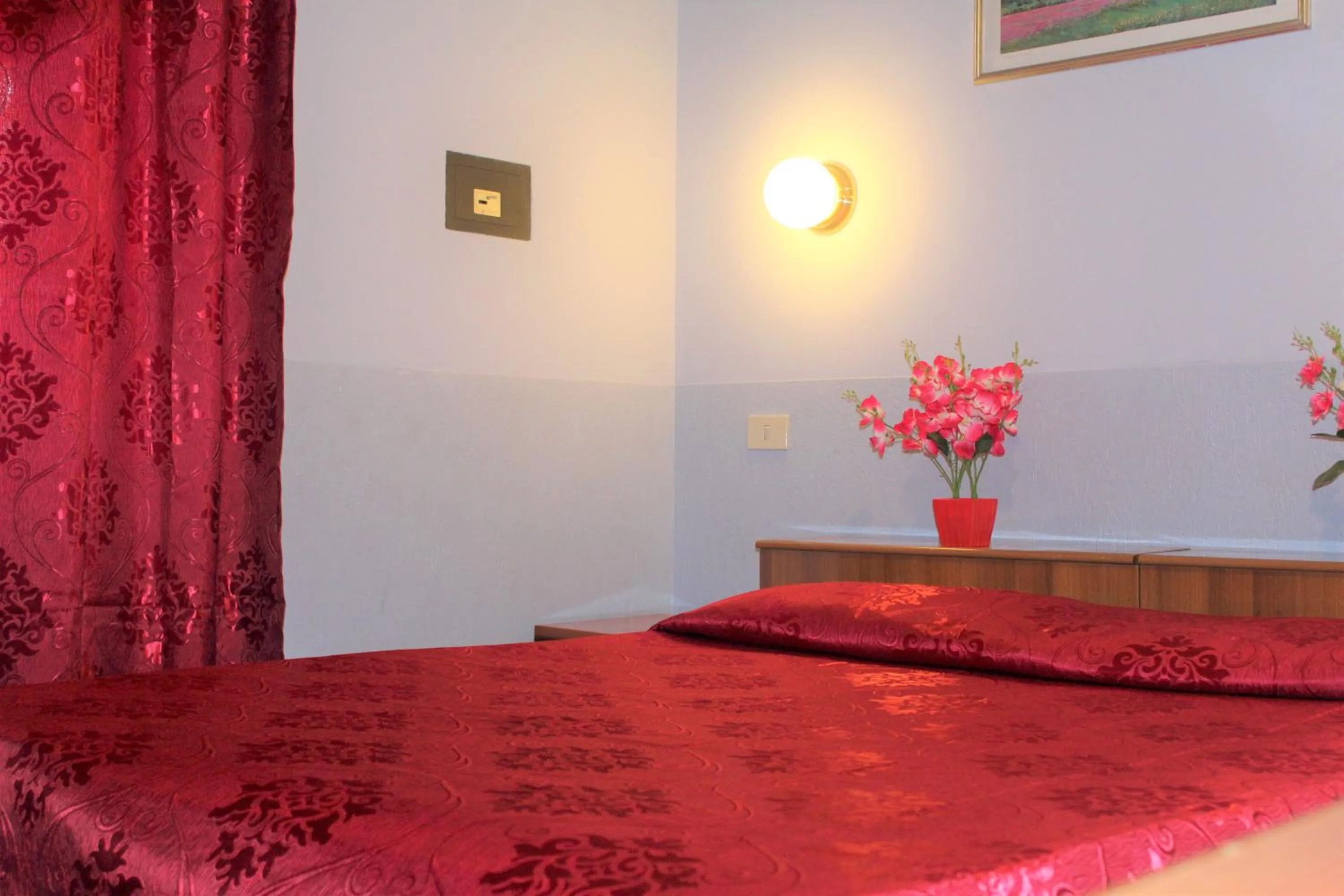 Bed in Hotel Eurorooms