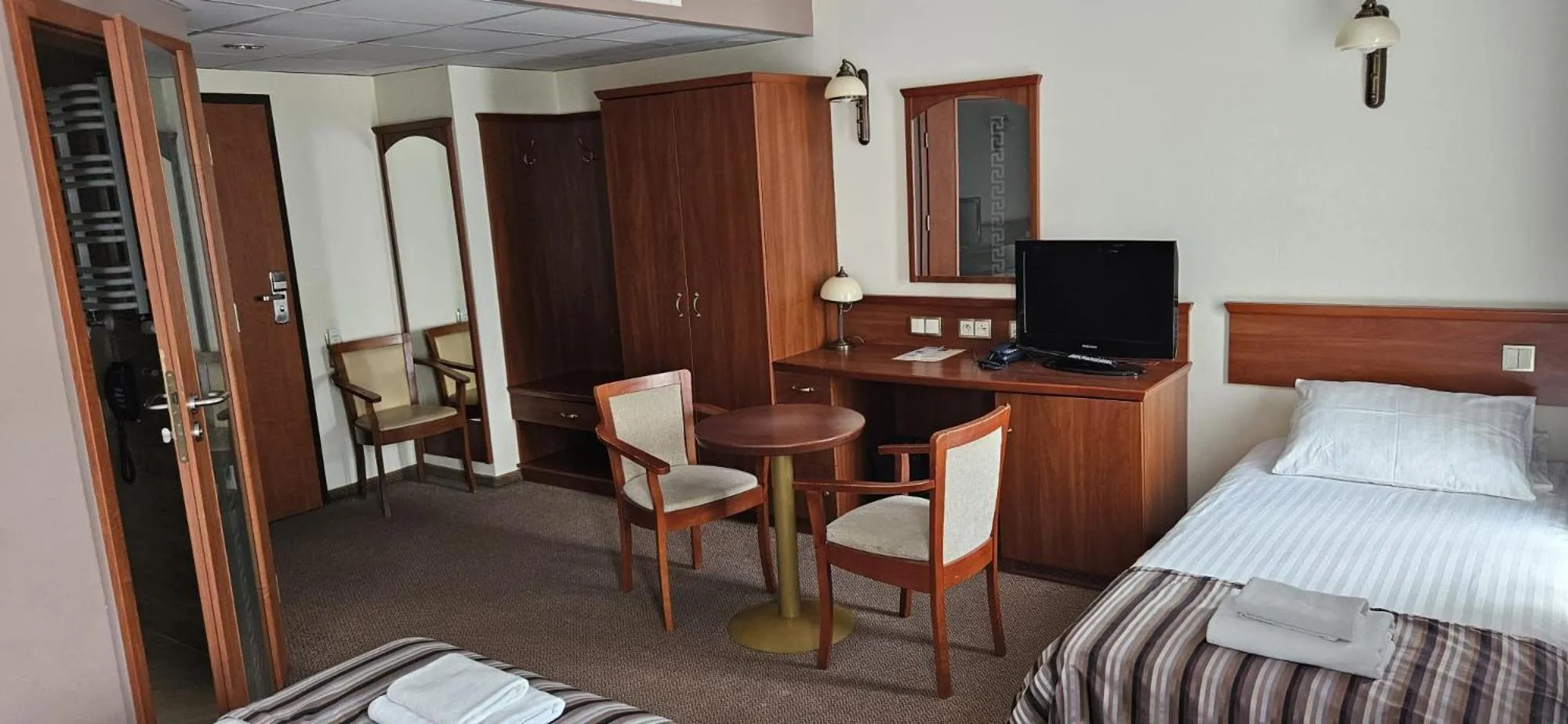 Seating area, Bed in Hotel Great Polonia Conrad Kraków