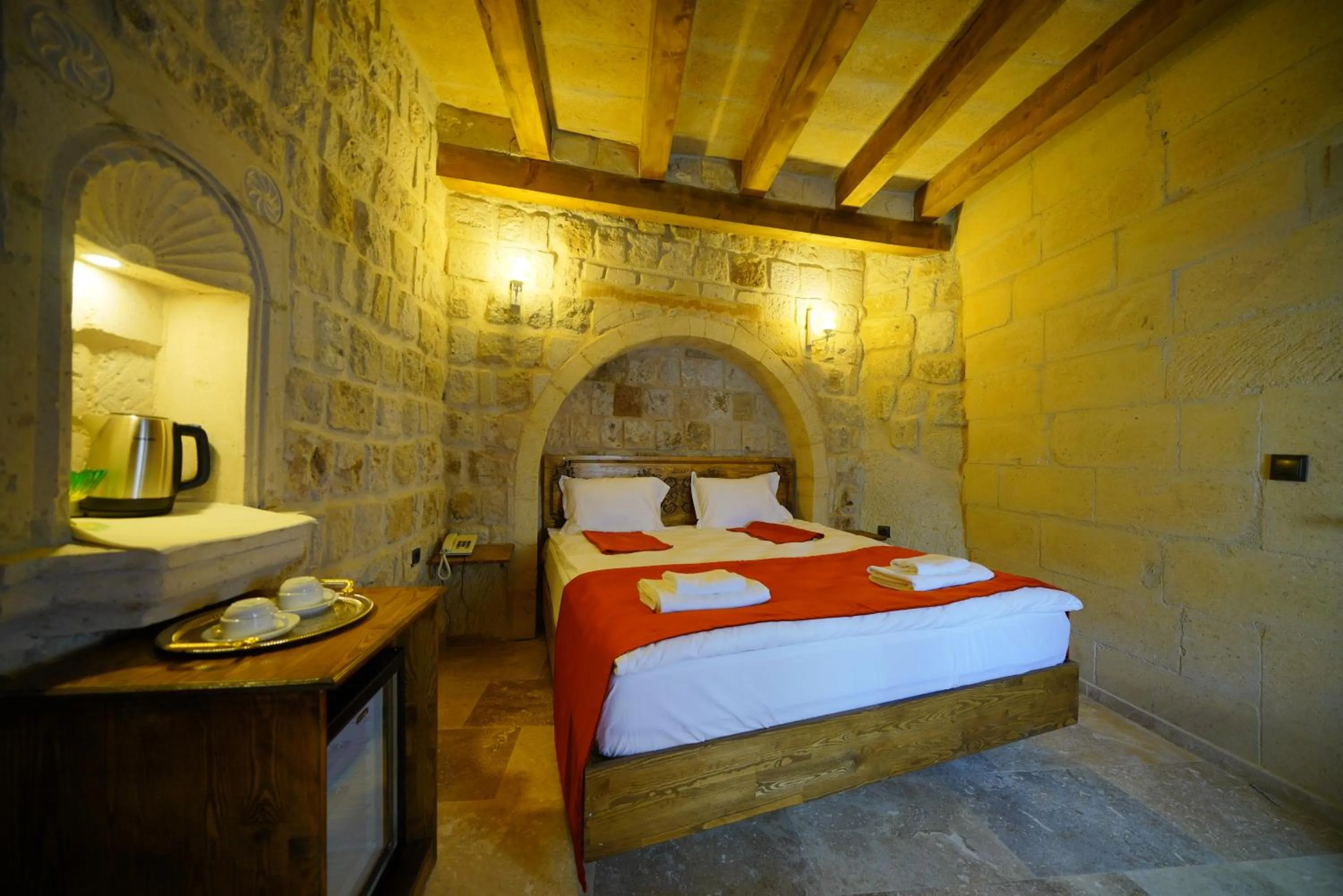 Bed in Vezir Cave Suites