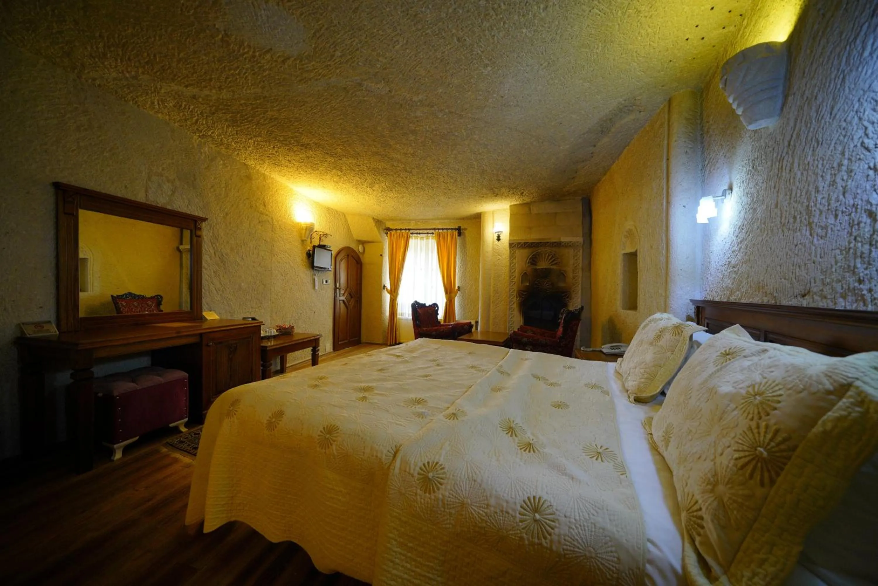 Bed in Vezir Cave Suites