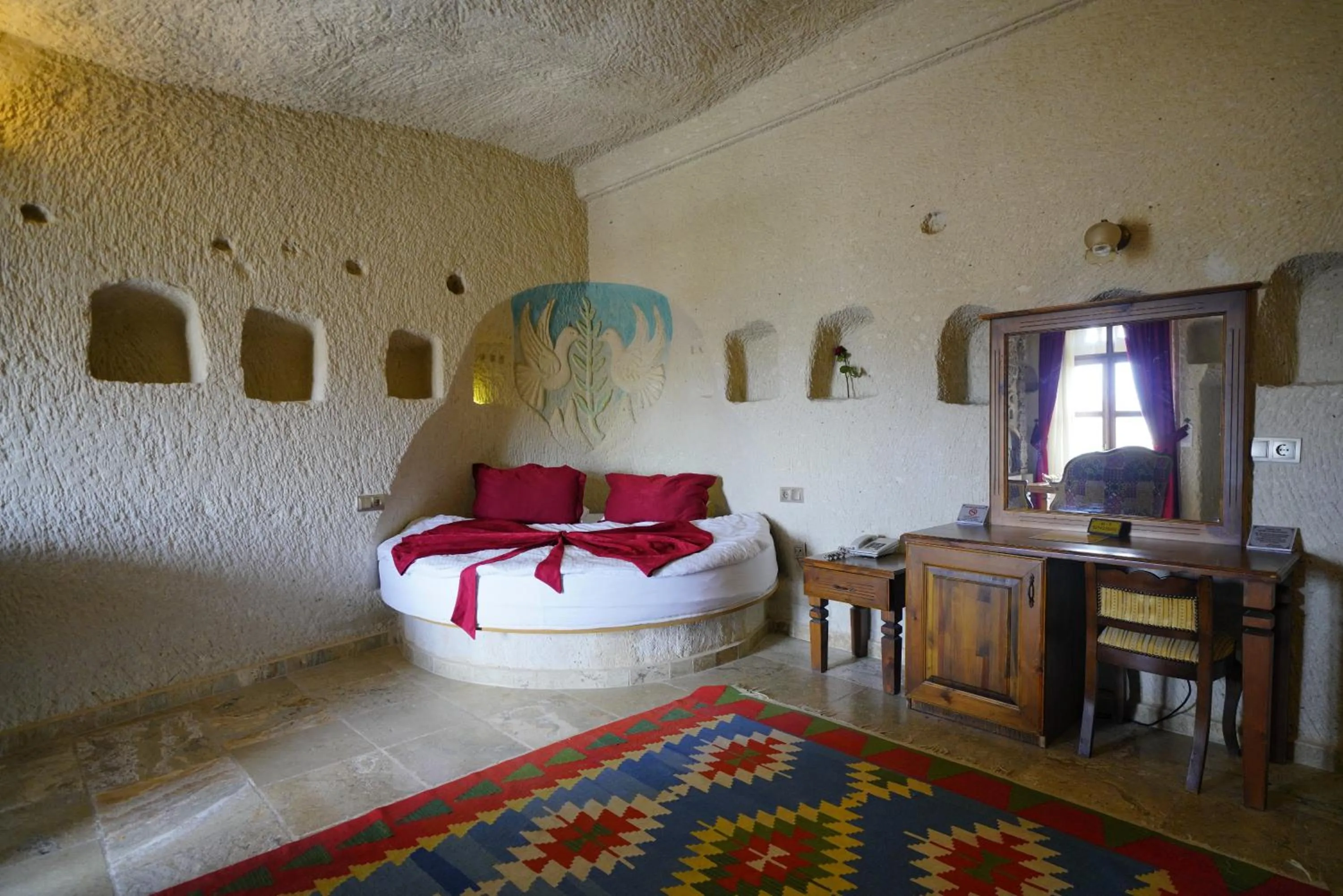 Bed in Vezir Cave Suites