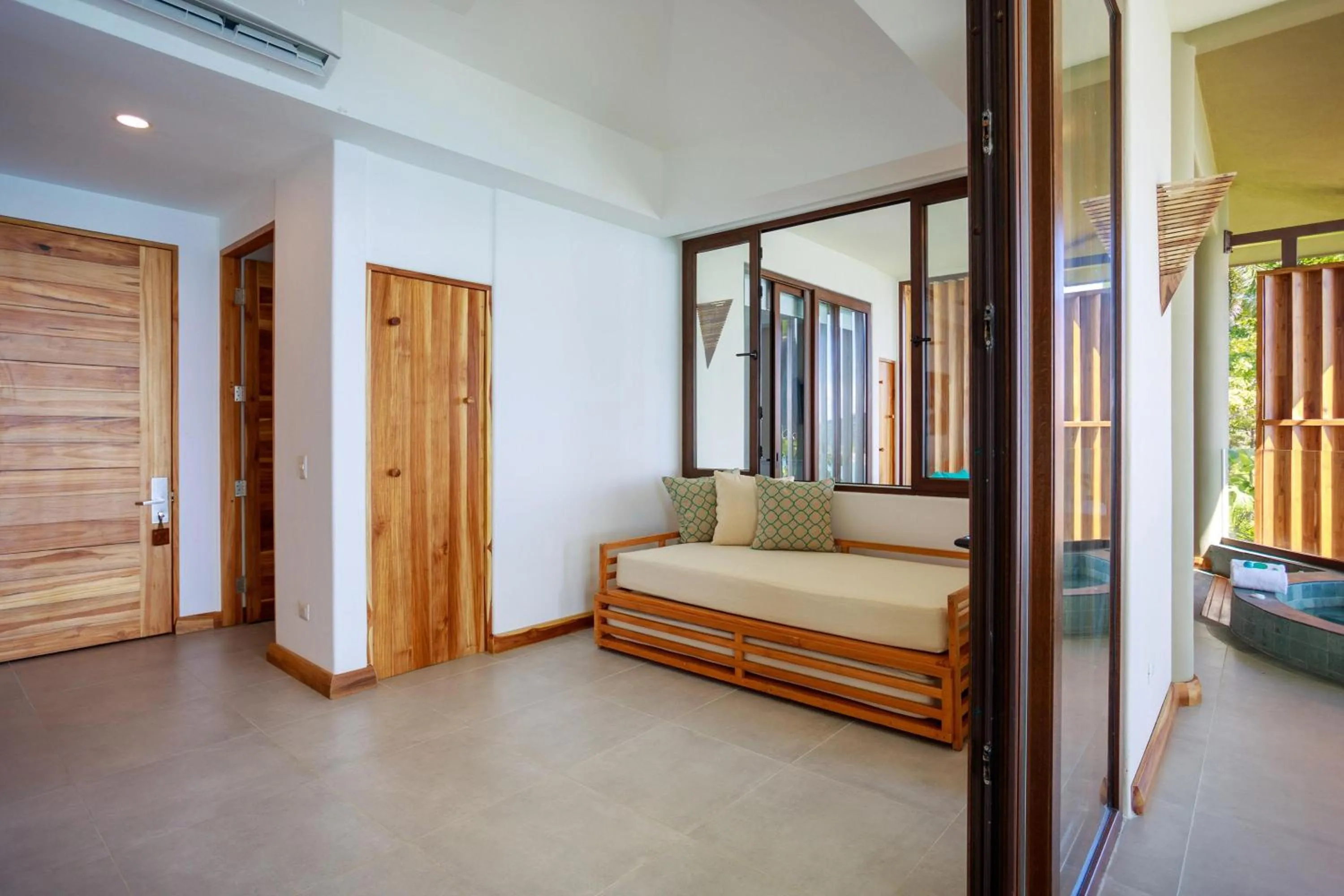 Photo of the whole room, Bed in Arenas Del Mar Beachfront & Rainforest Resort Member of the Cayuga Collection
