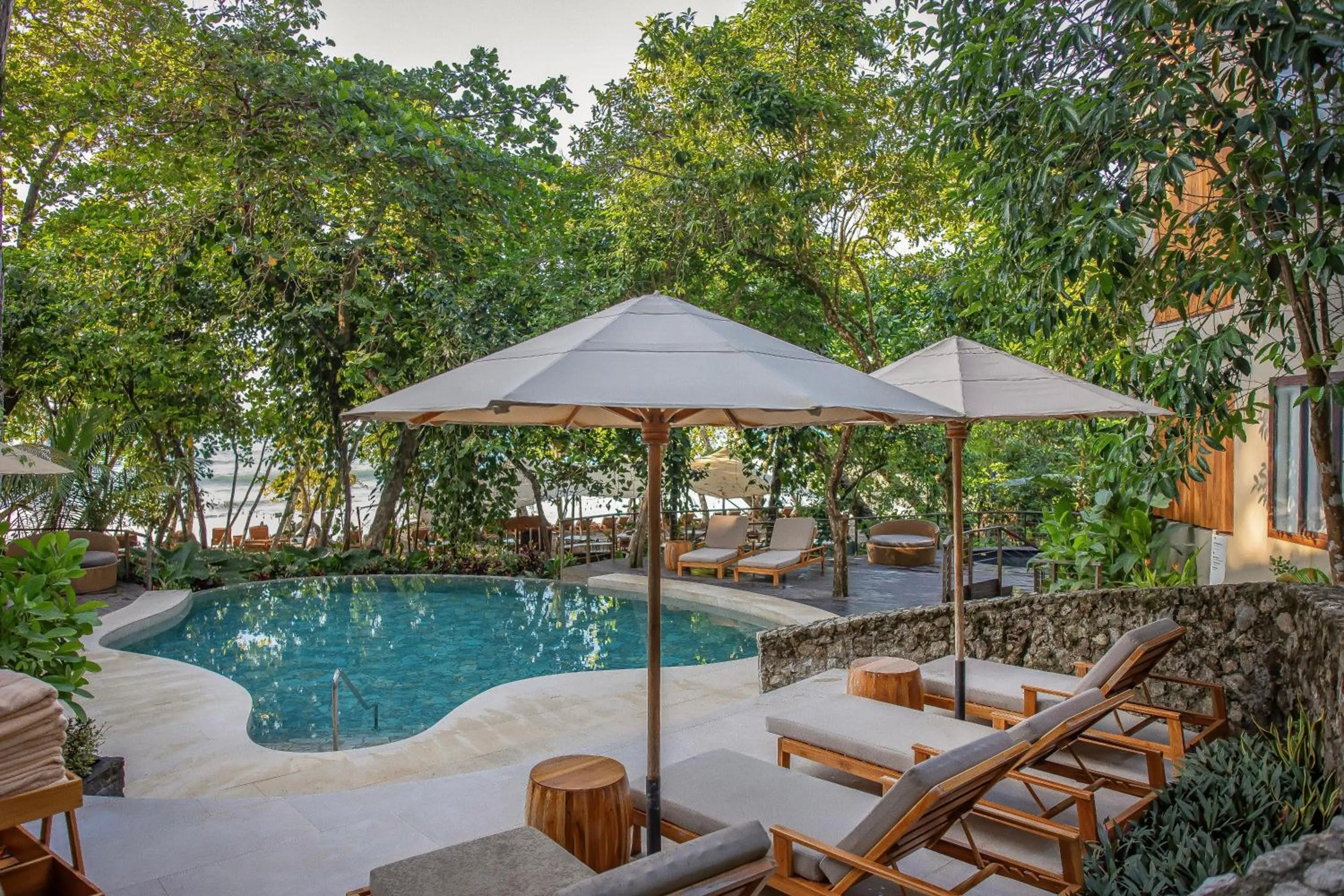 Swimming pool in Arenas Del Mar Beachfront & Rainforest Resort Member of the Cayuga Collection