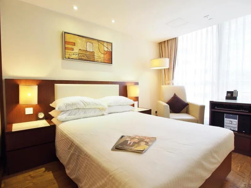 Bed in 218 Apartment