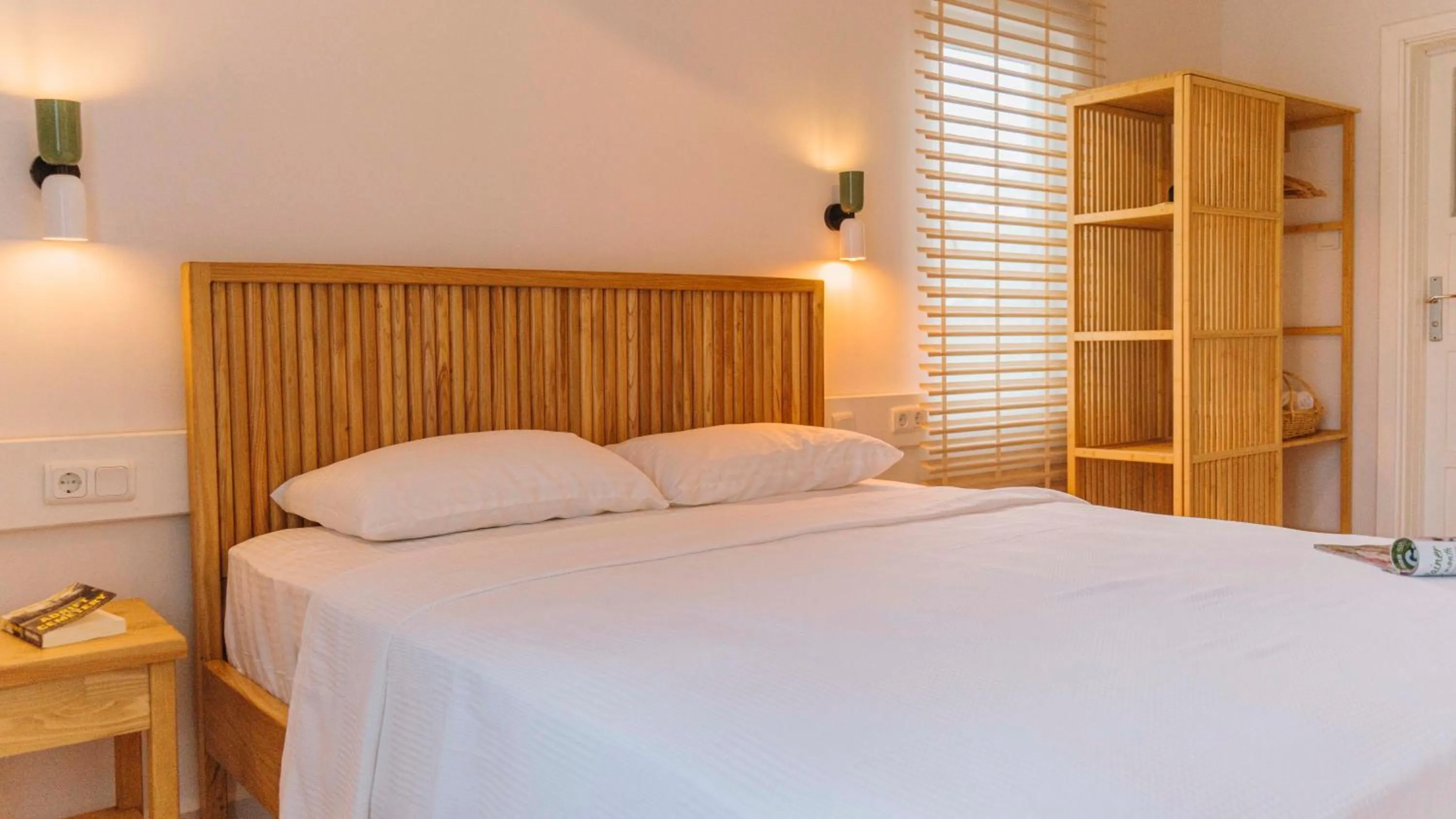 Bed in Golden Lighthouse Hotel