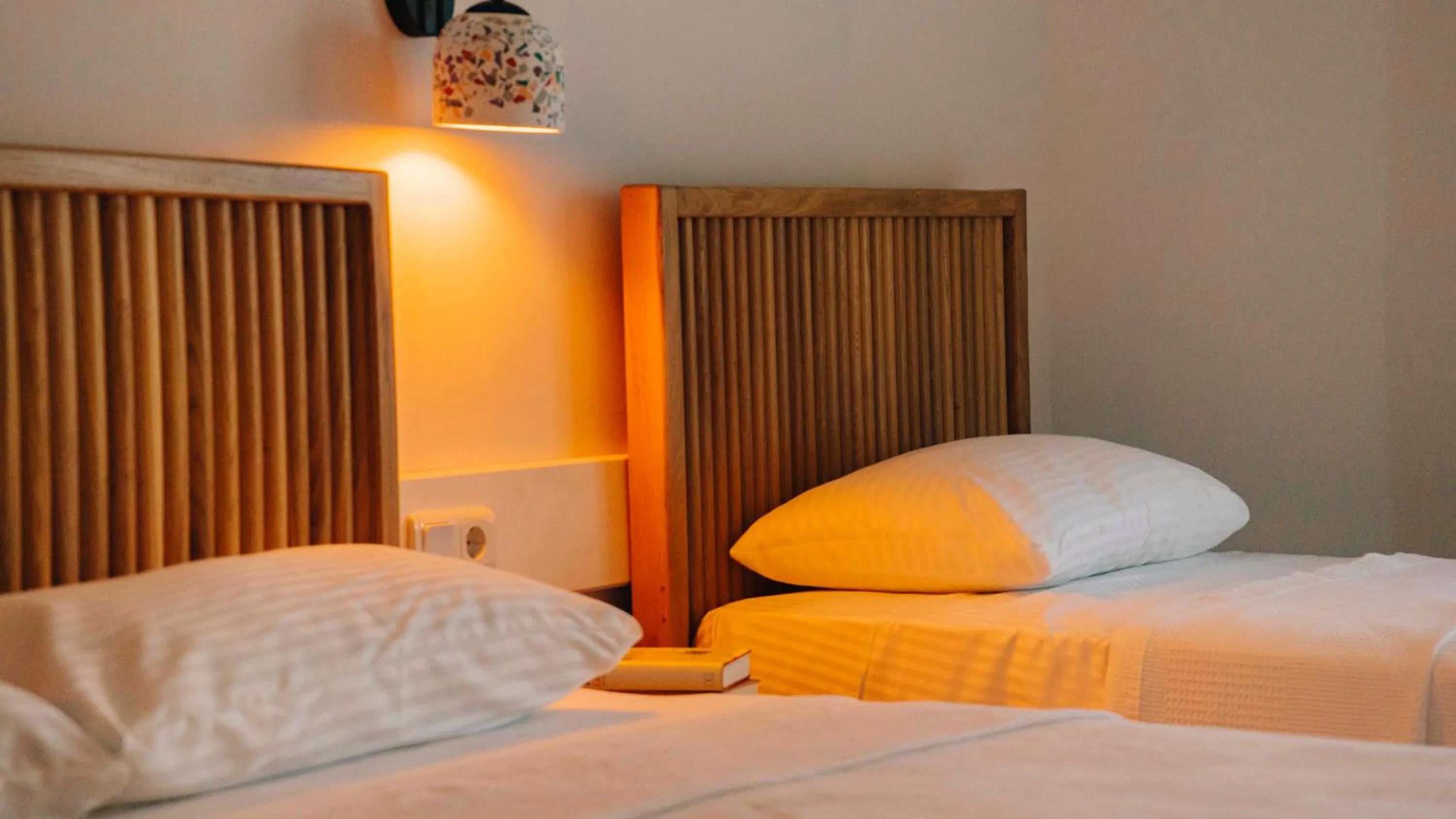 Bed in Golden Lighthouse Hotel