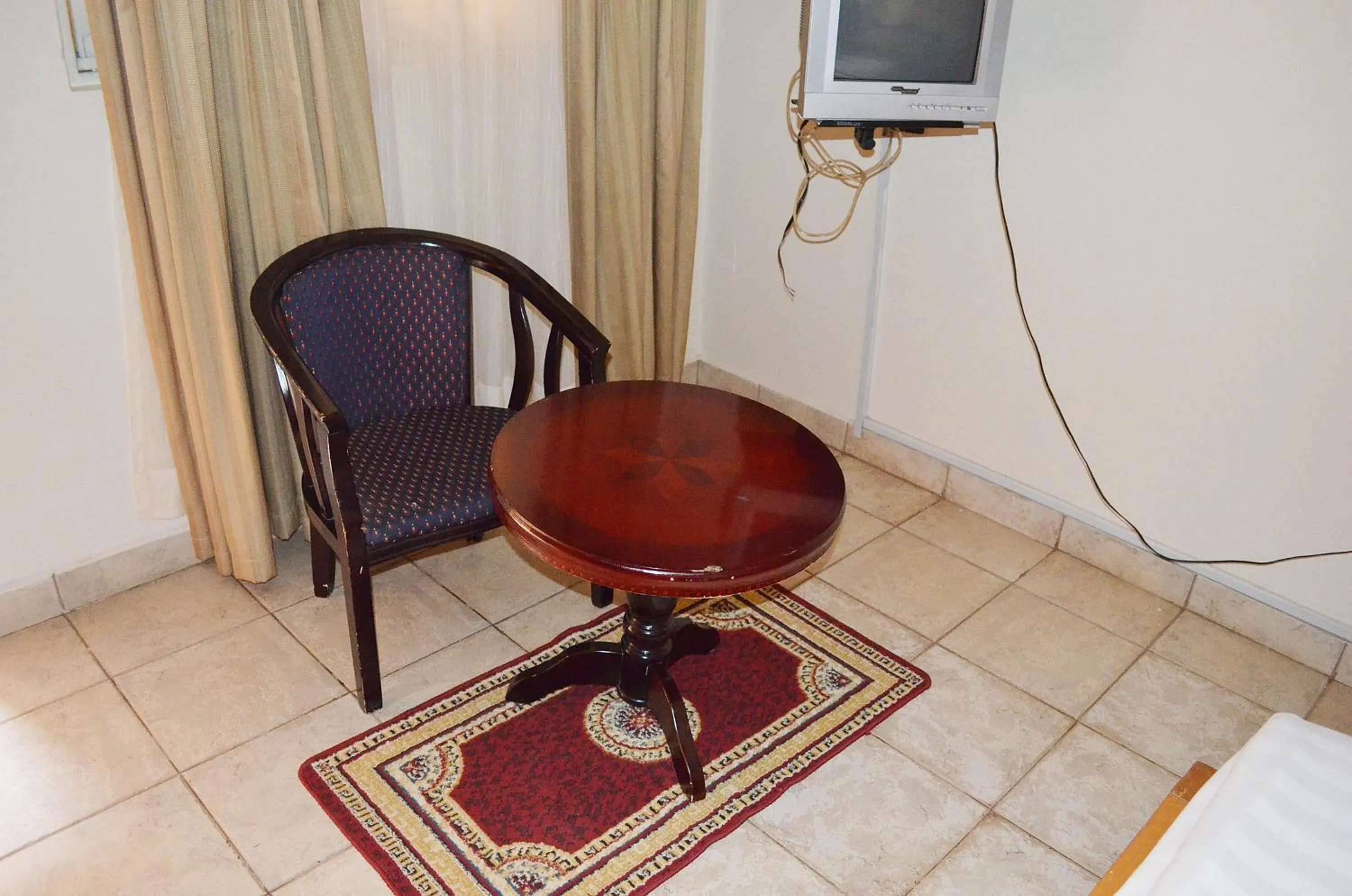 Seating area in Victoria Travel Hotel