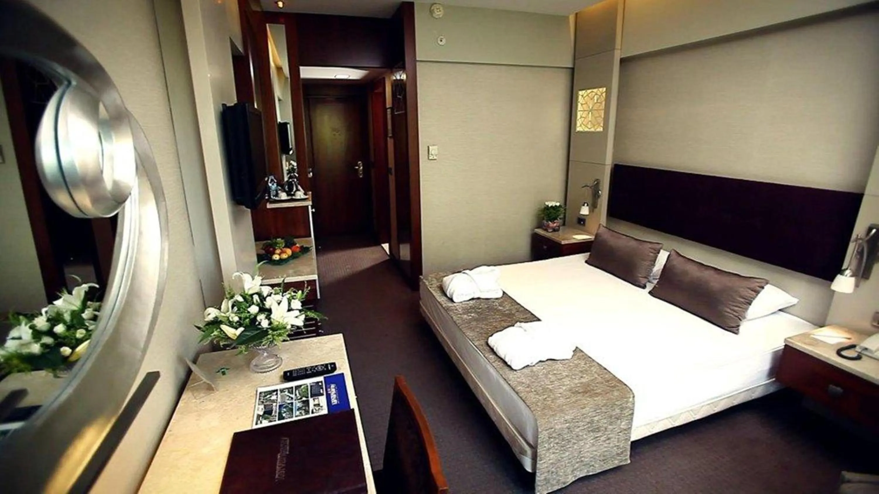 Bed in Kervansaray Thermal Convention Center & Spa