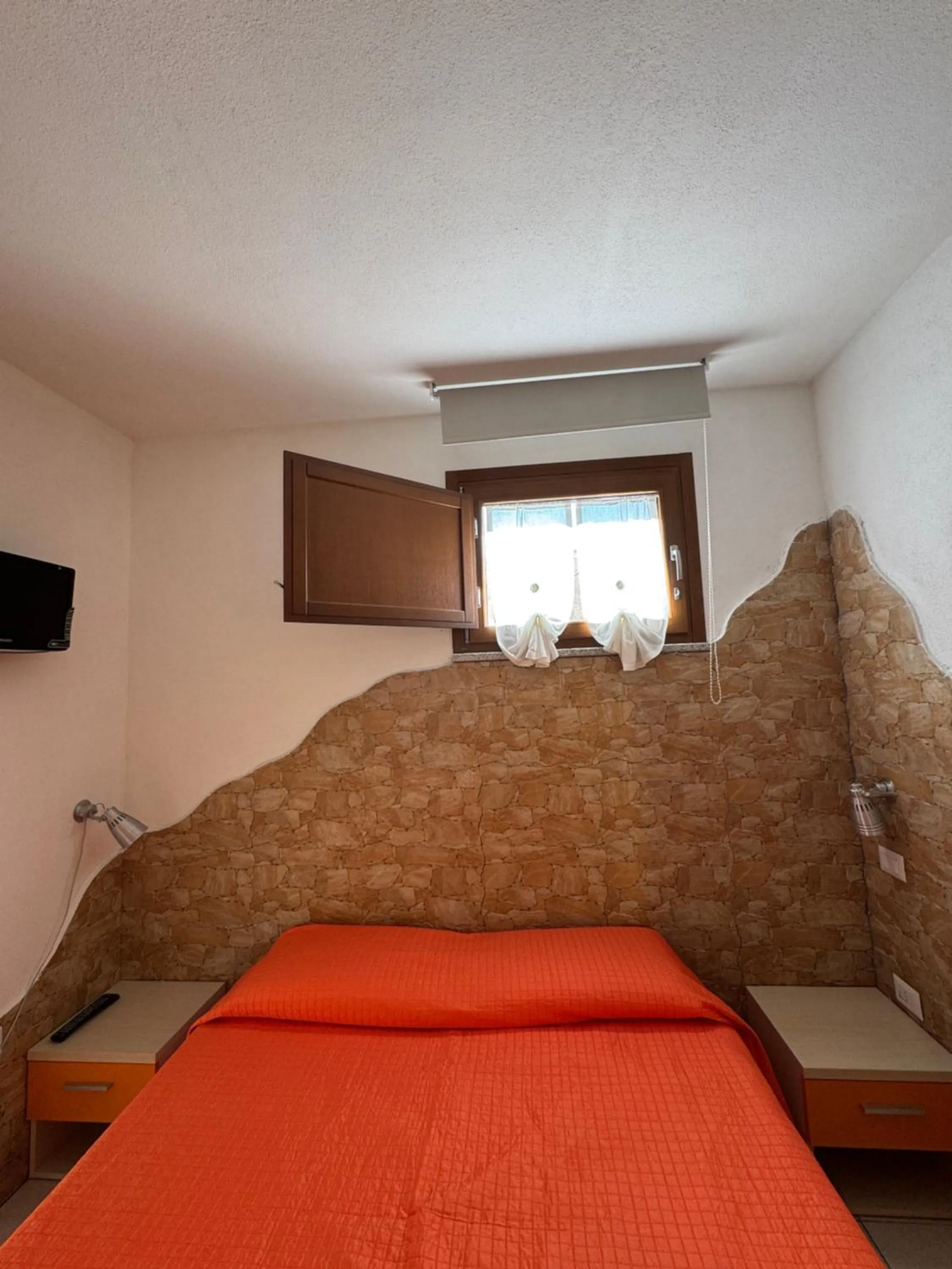 Bedroom in Sa Mamma e Sole B&B