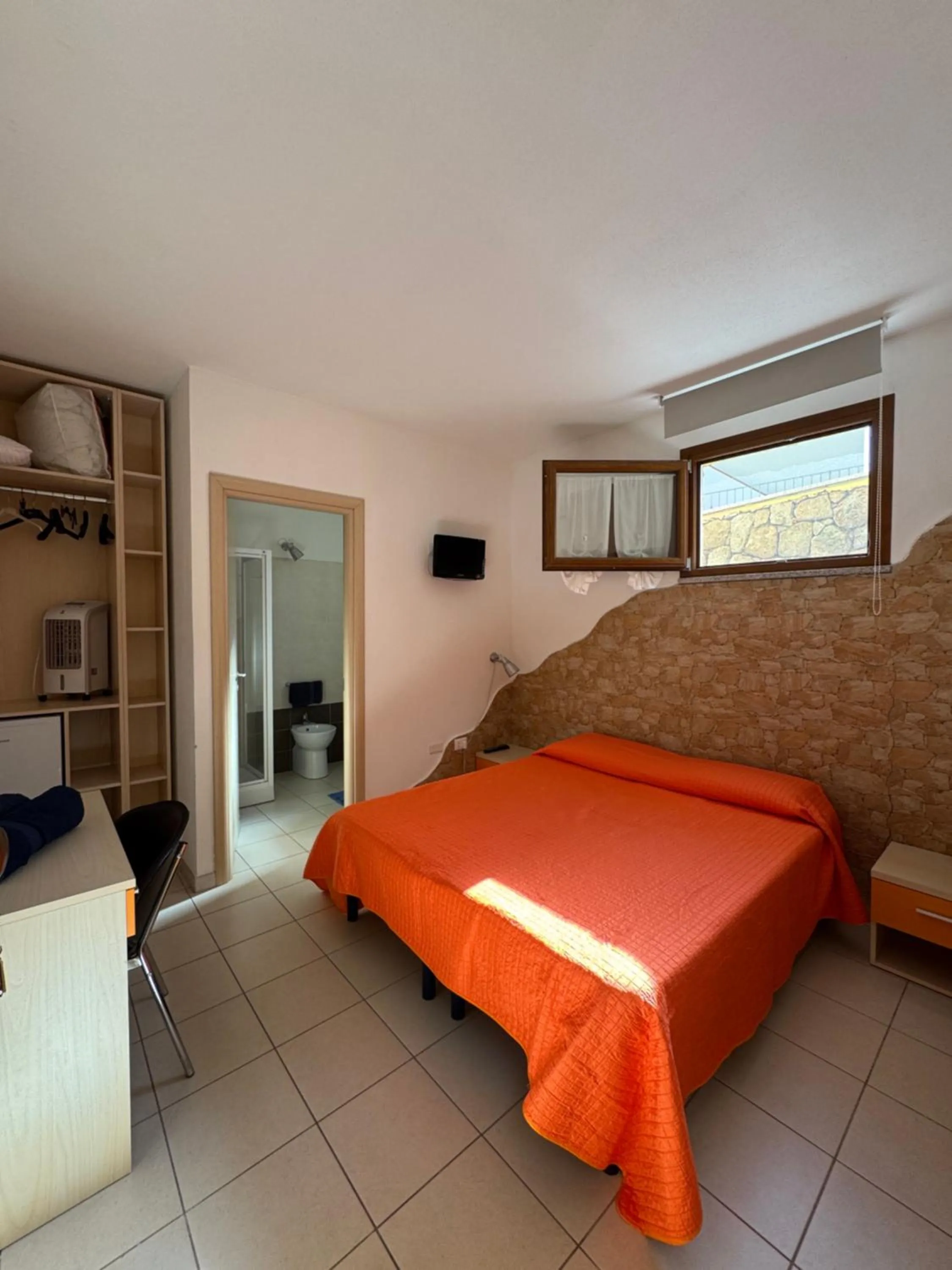 Bedroom in Sa Mamma e Sole B&B