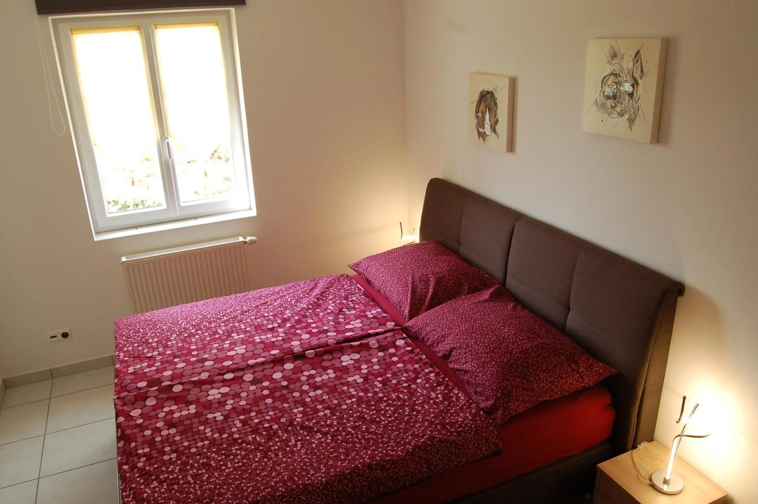 Bed in Ferienwohnung Frate