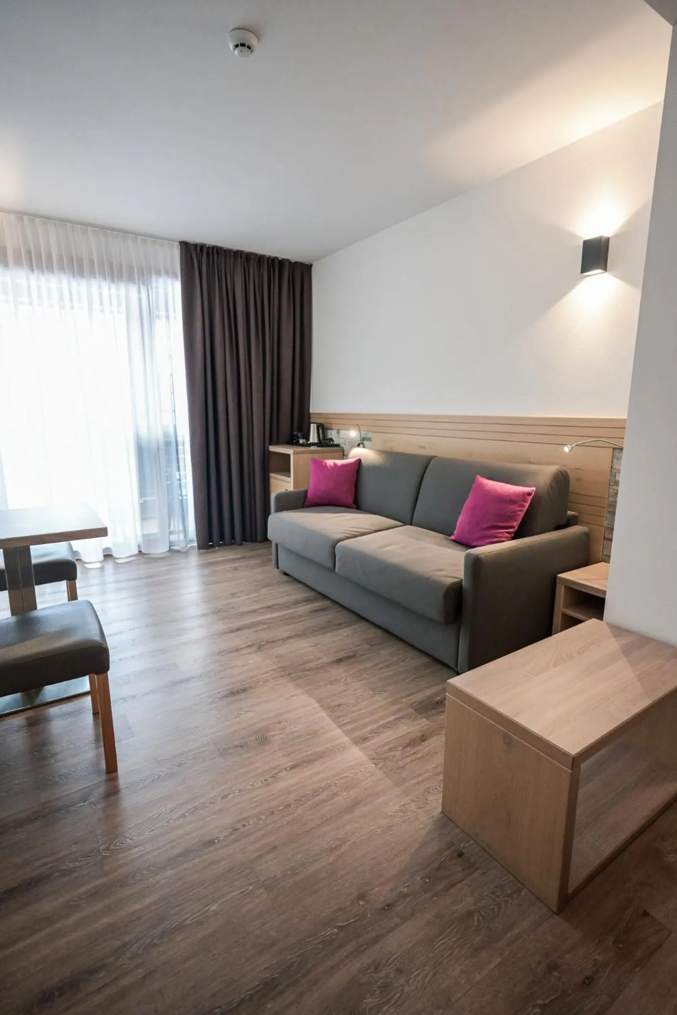 Seating area in Olimpionico Hotel