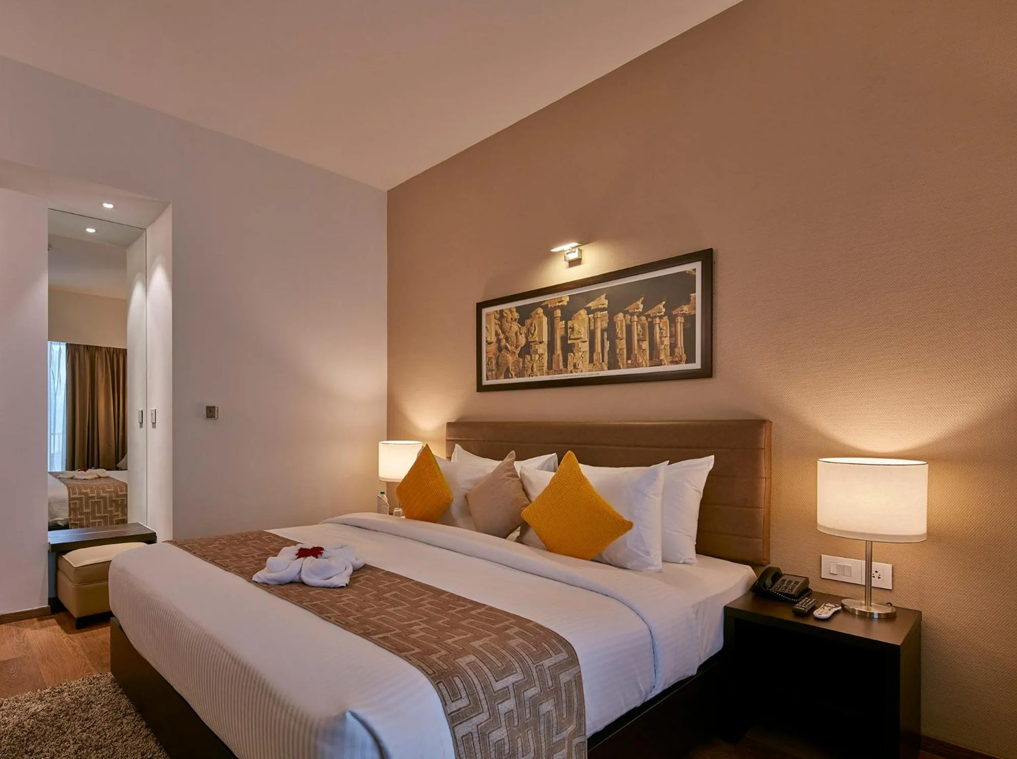 Bed in Signature Club Resort