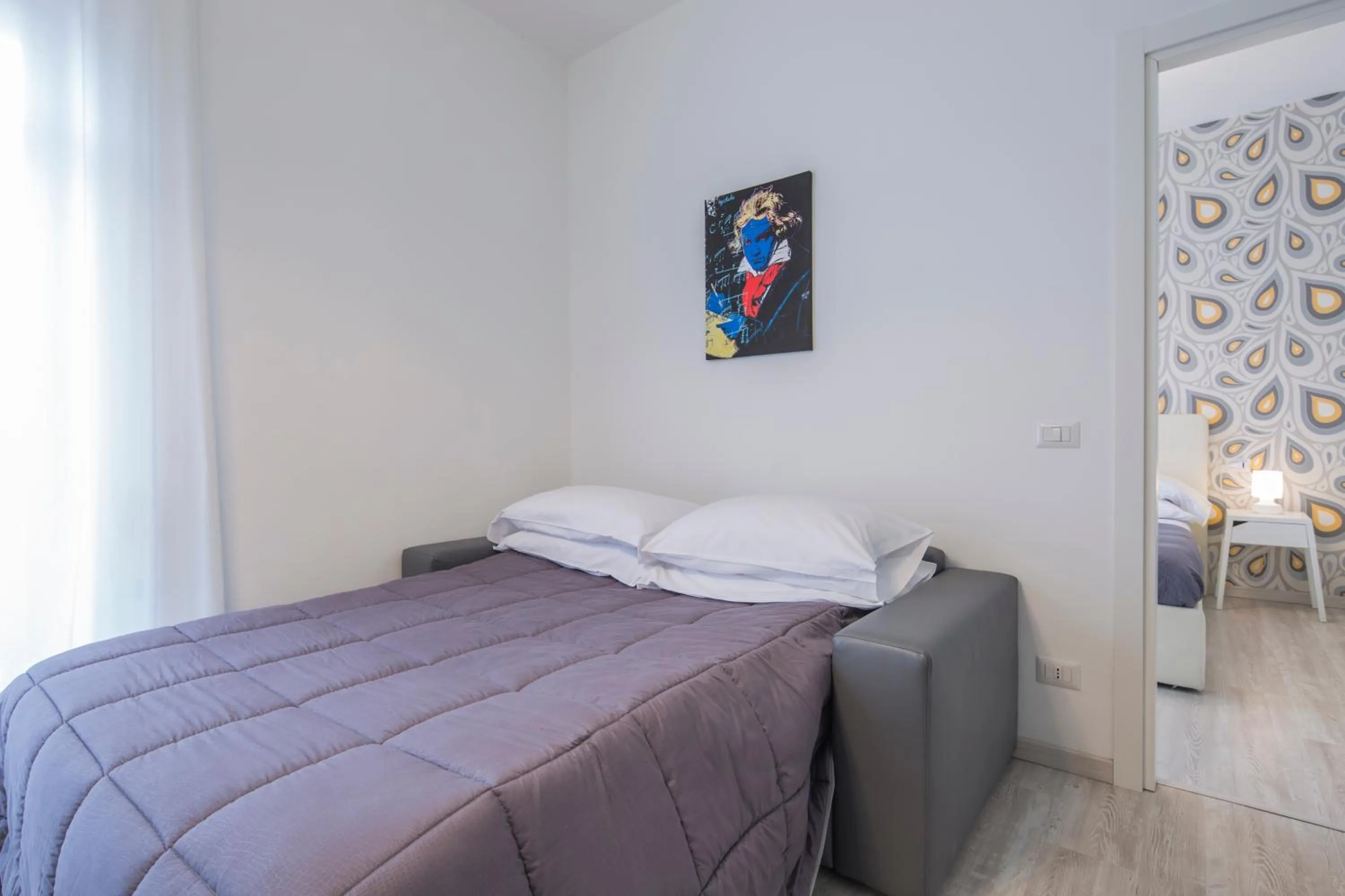 Bed in Flower Suites Sorrento