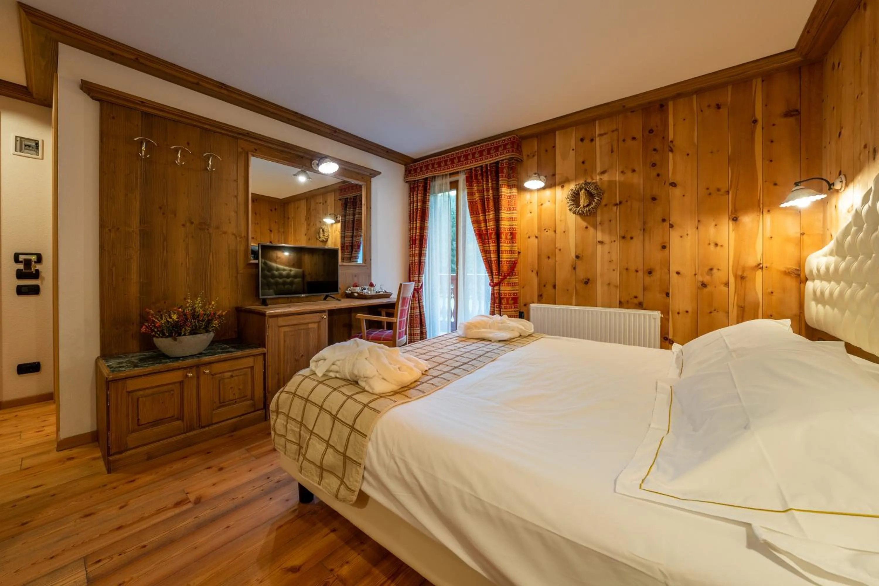 Bed in Lo Scoiattolo Hotel