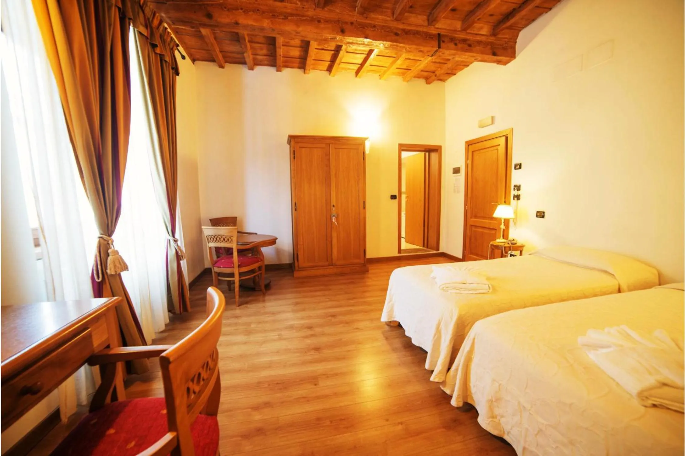 Photo of the whole room, Bed in HG Abetone e Piramidi Resort