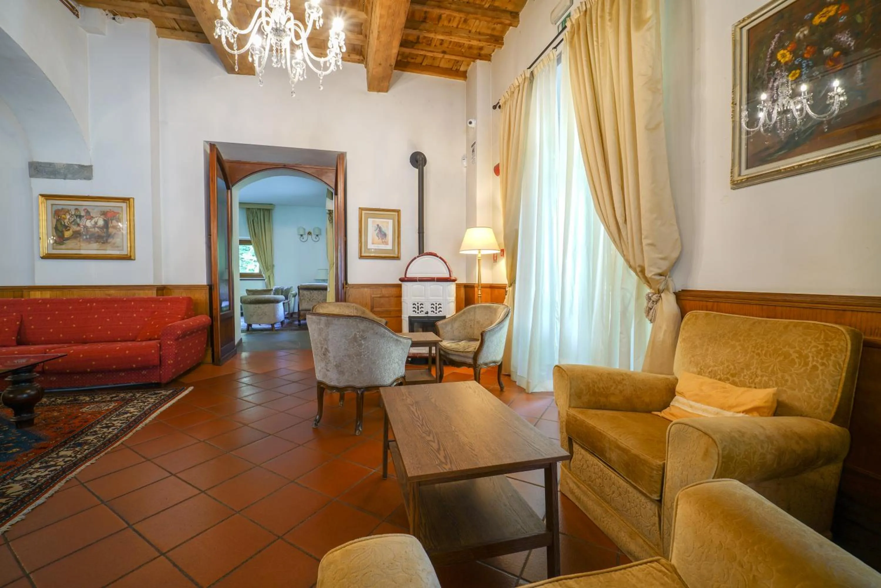 Communal lounge/ TV room in HG Abetone e Piramidi Resort