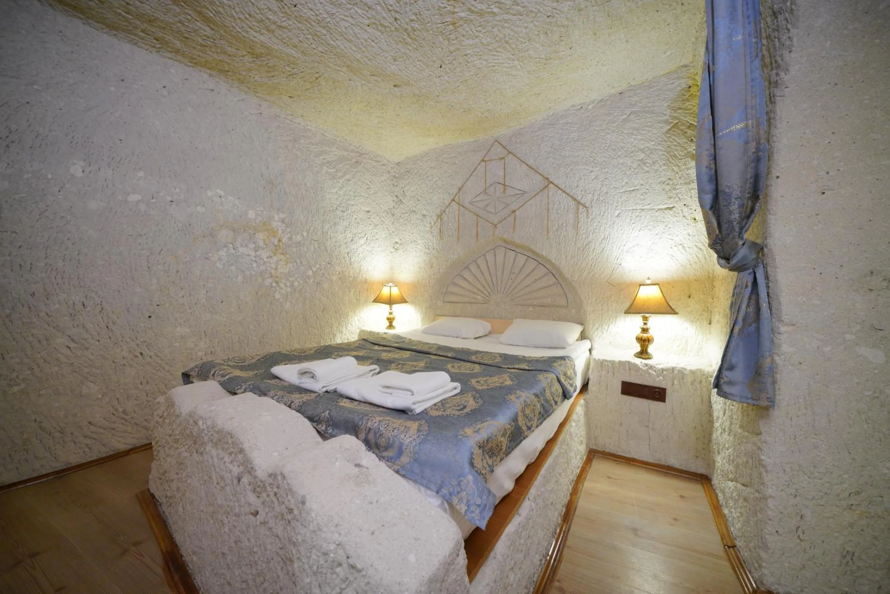 Bed in Asteria Cave Hotel