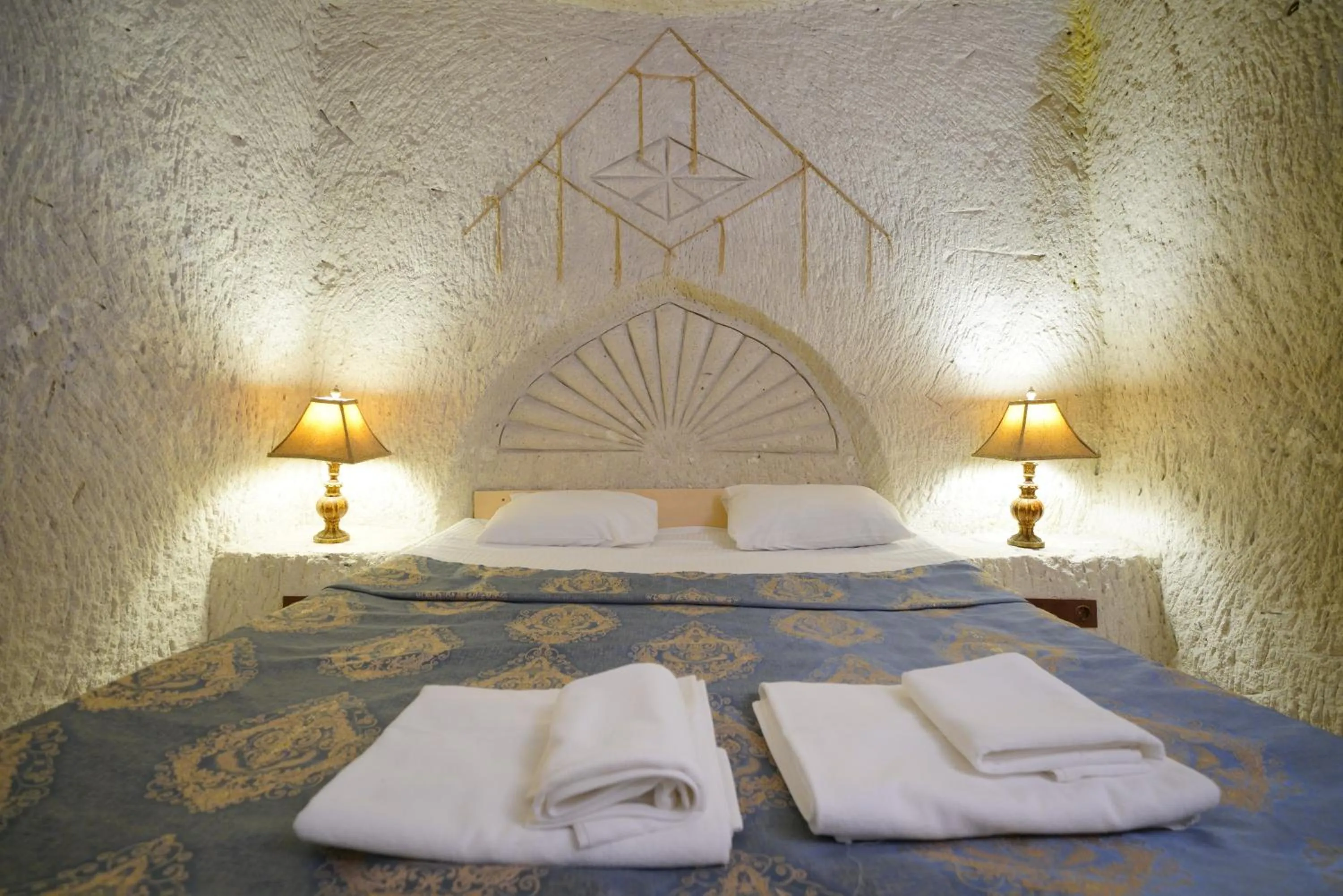 Bed in Asteria Cave Hotel