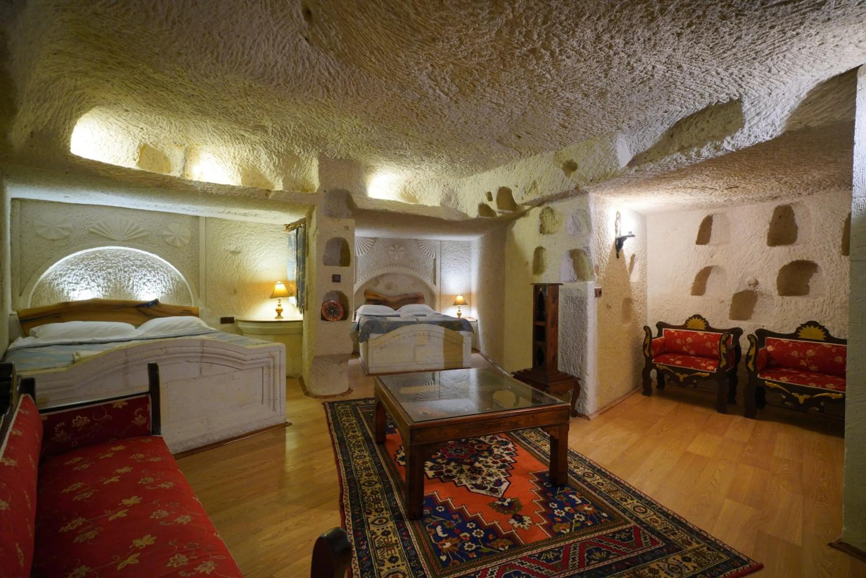 Living room, Bed in Asteria Cave Hotel