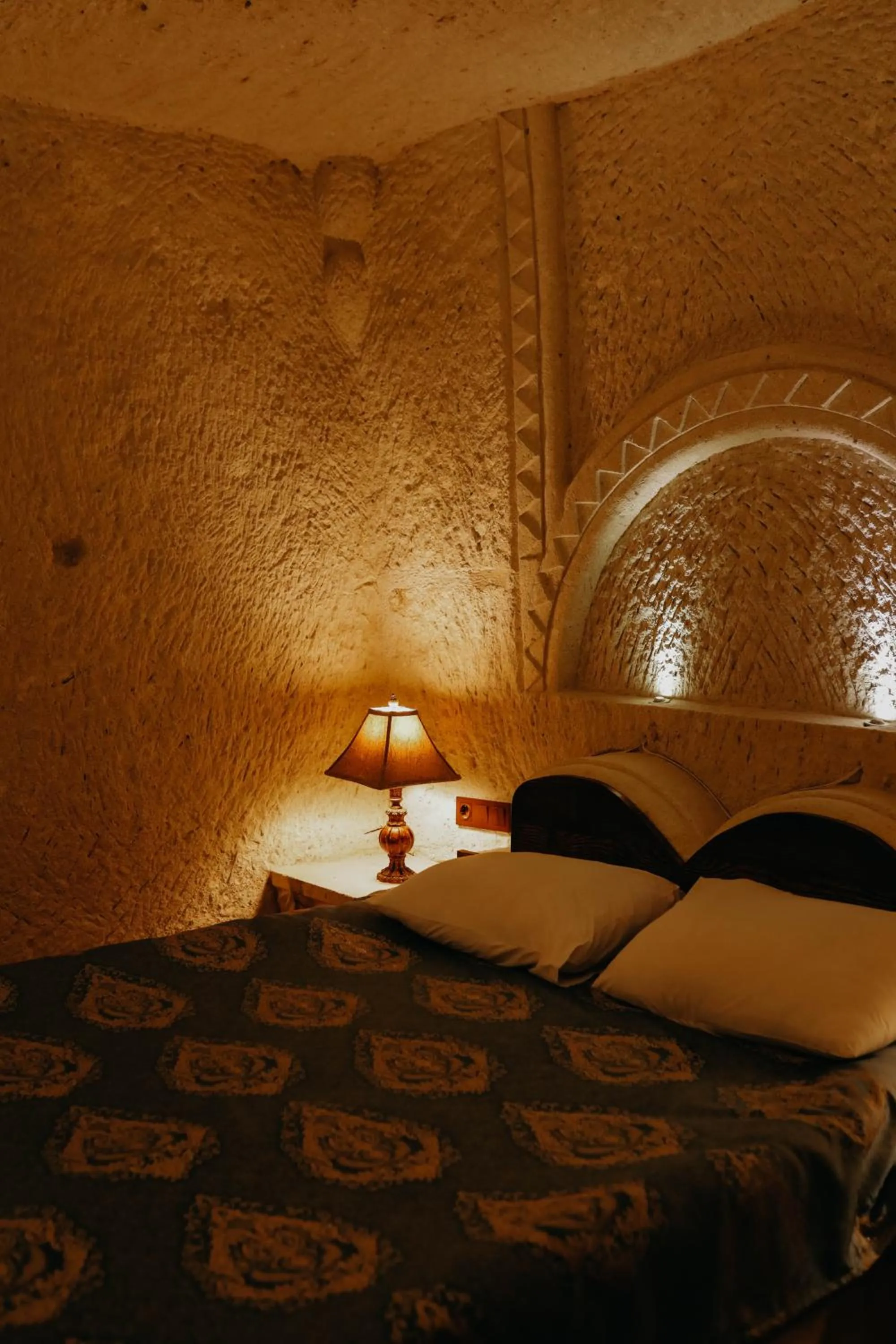 Bed in Asteria Cave Hotel
