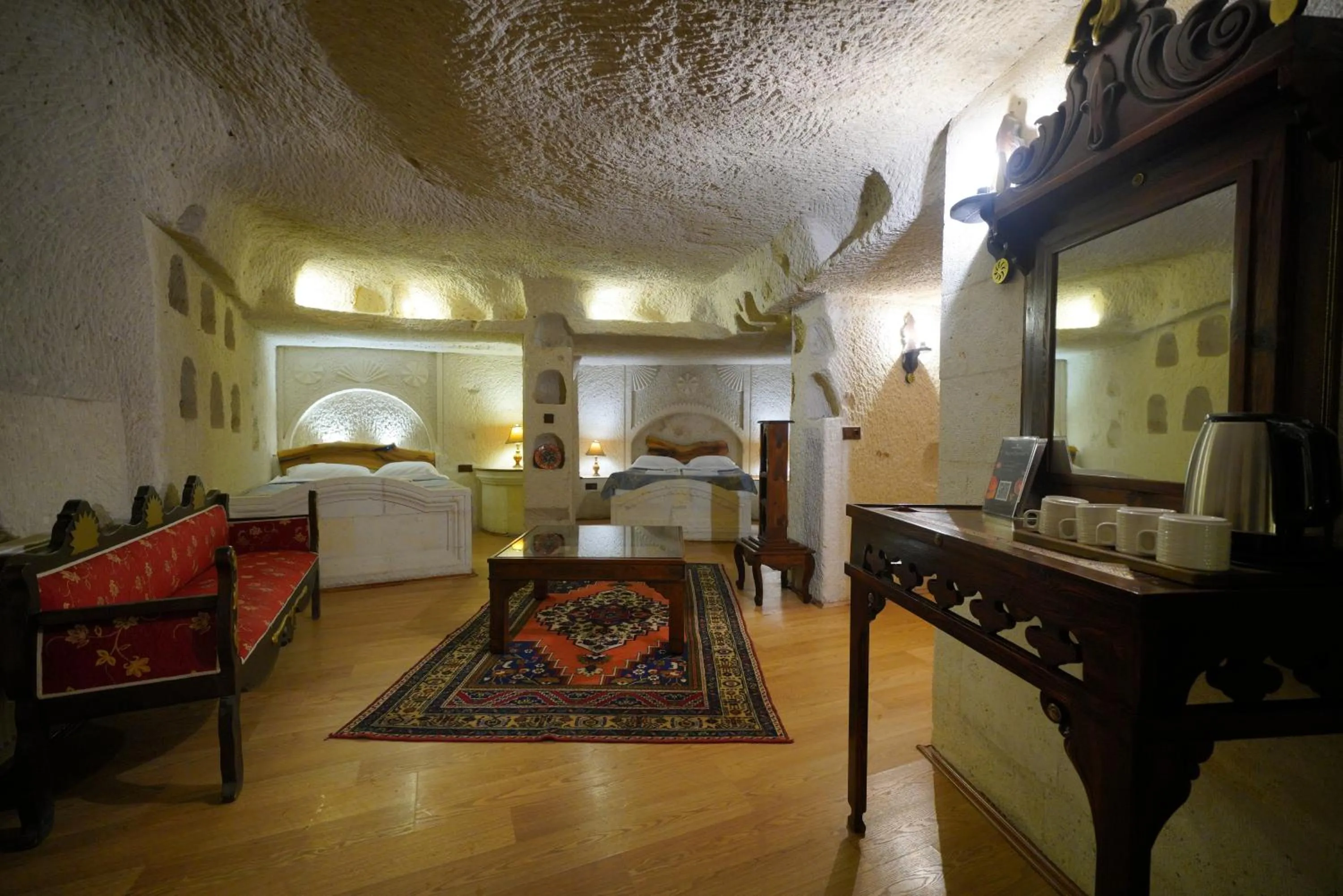 Living room, Bed in Asteria Cave Hotel