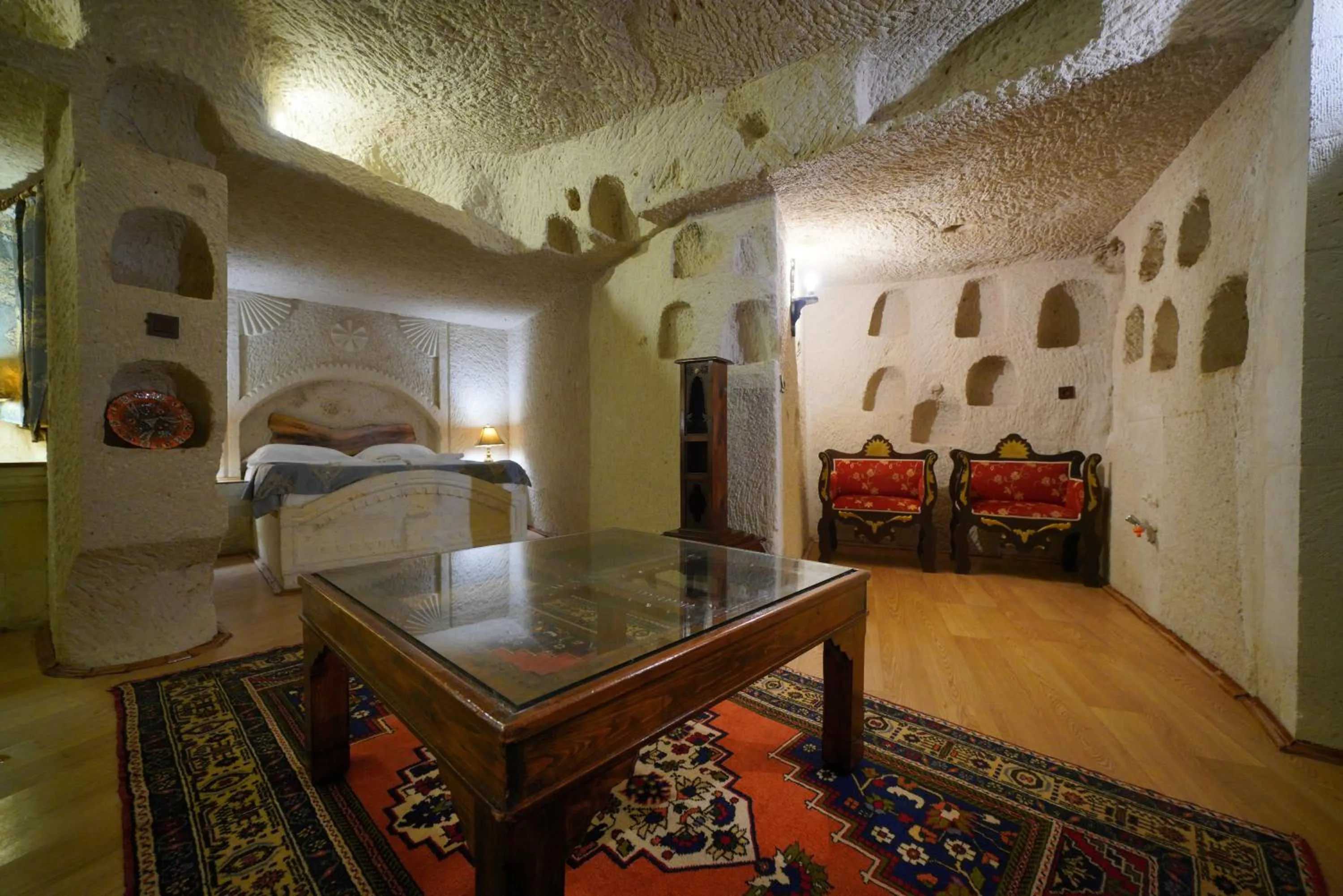 Living room, Bed in Asteria Cave Hotel