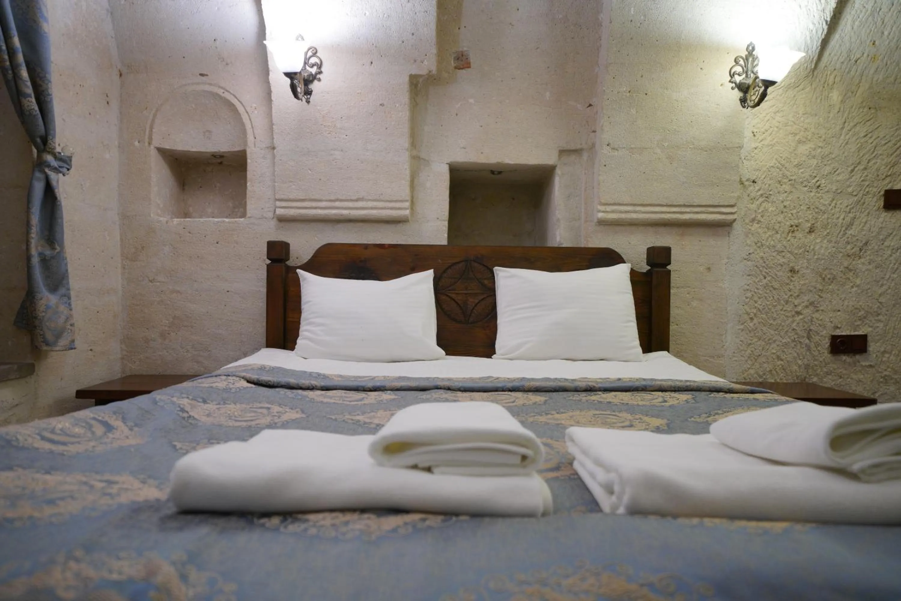 Bed in Asteria Cave Hotel