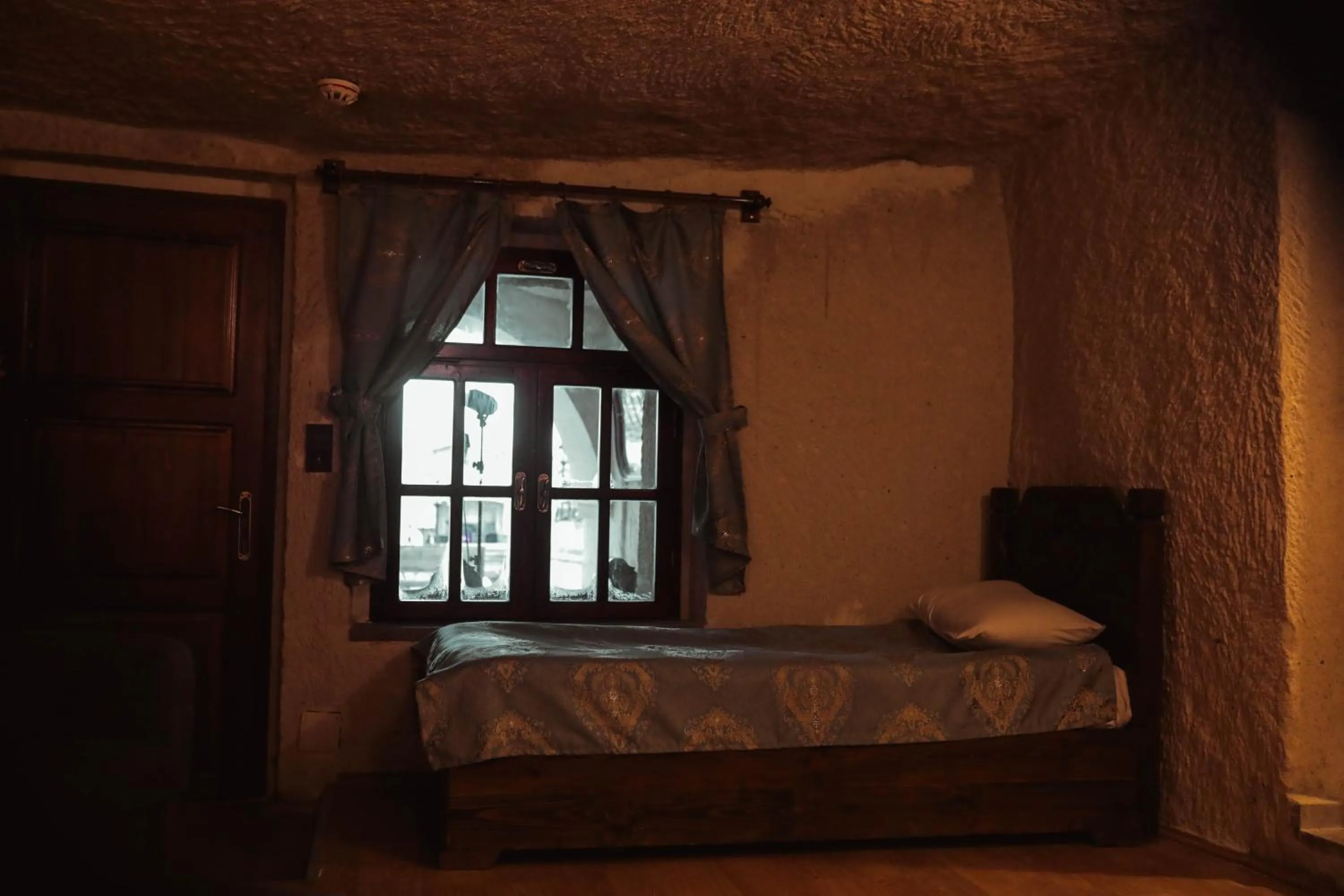 Bed in Asteria Cave Hotel