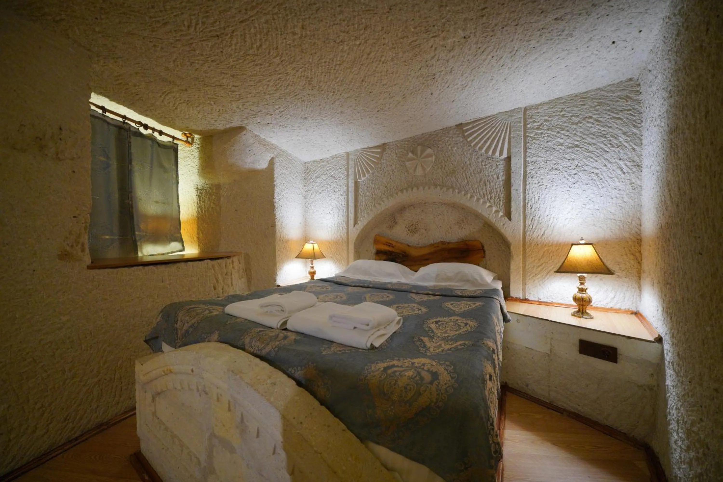 Bed in Asteria Cave Hotel