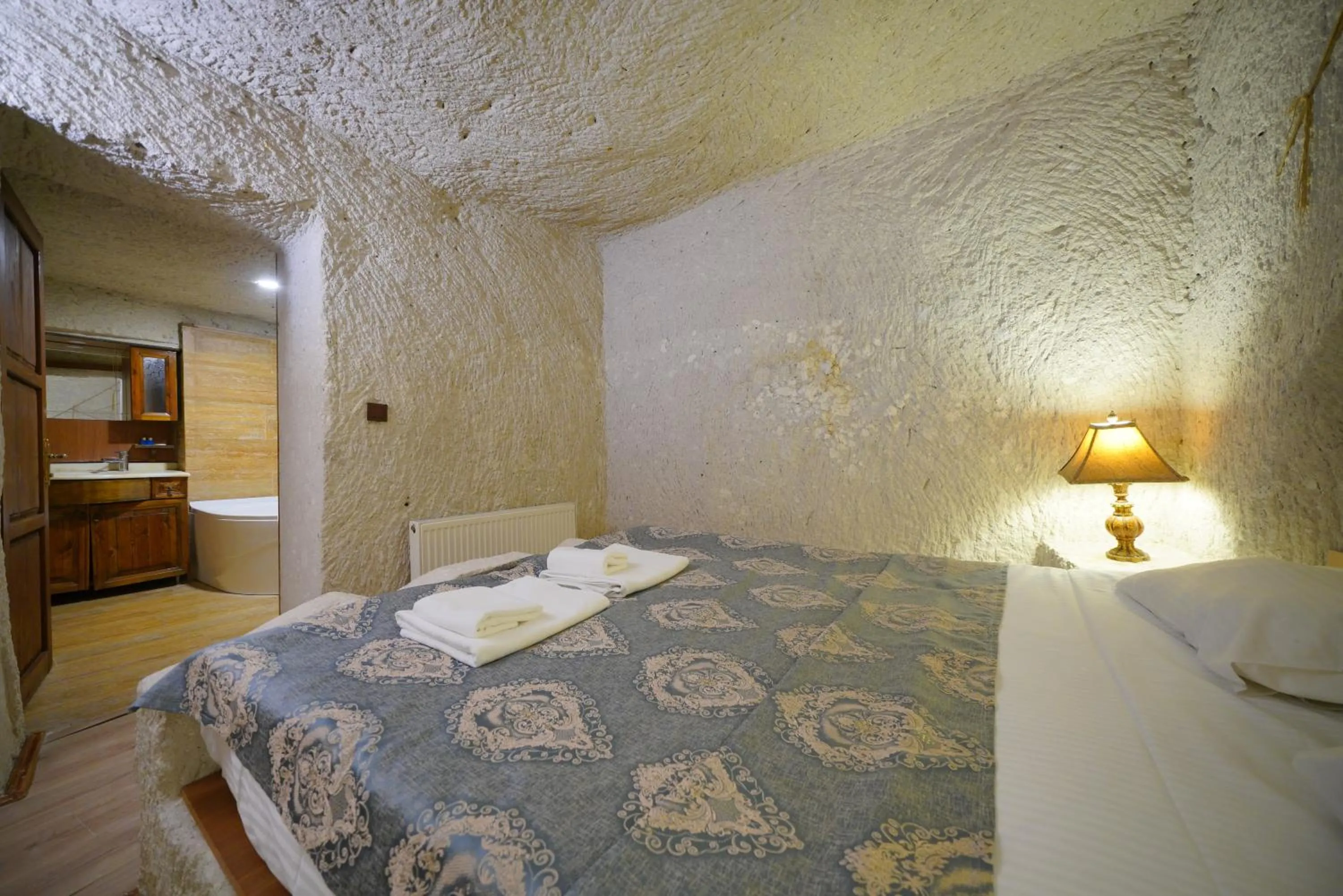 Bed in Asteria Cave Hotel