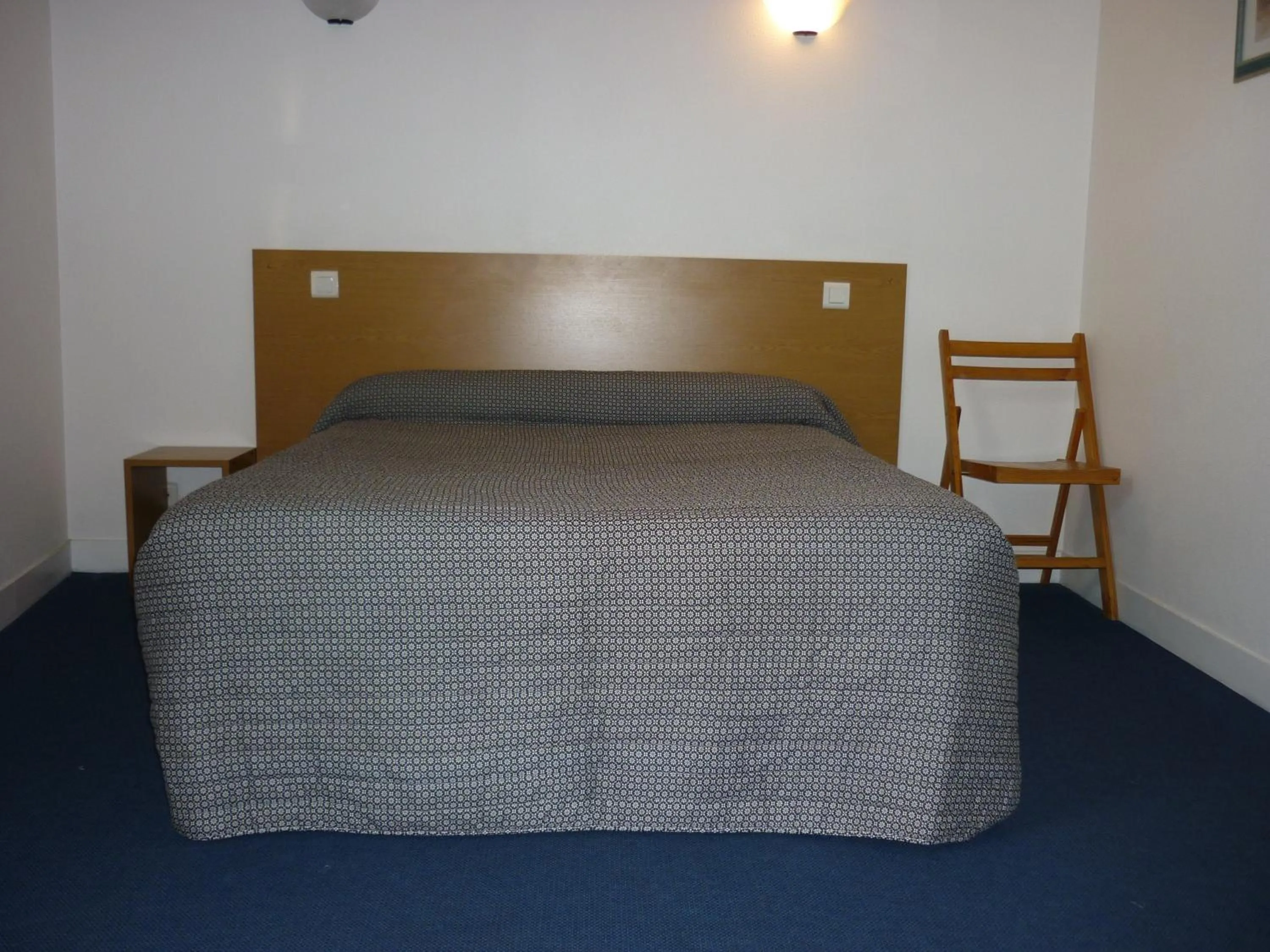 Bed in Hotel Neptune