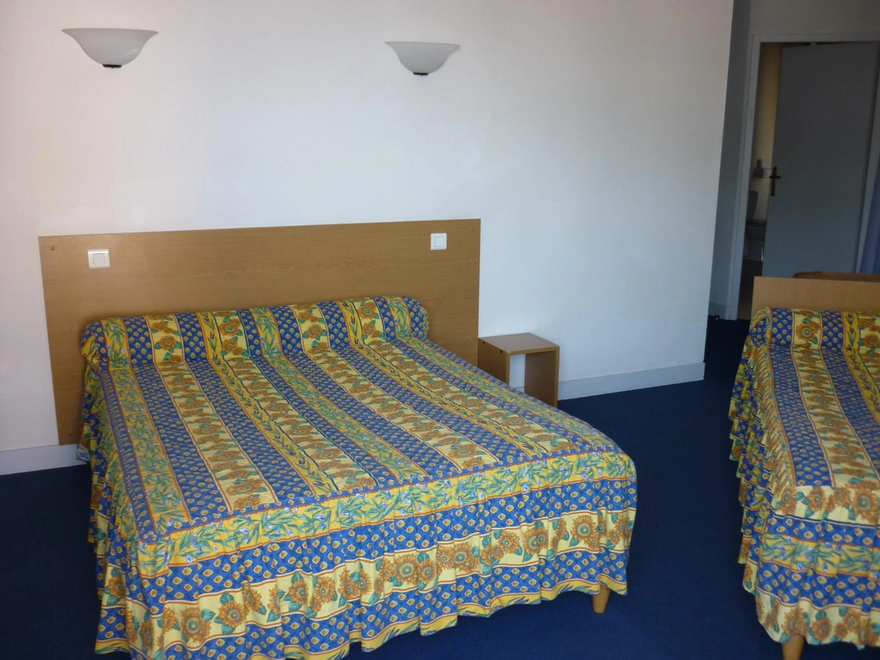 Bed in Hotel Neptune