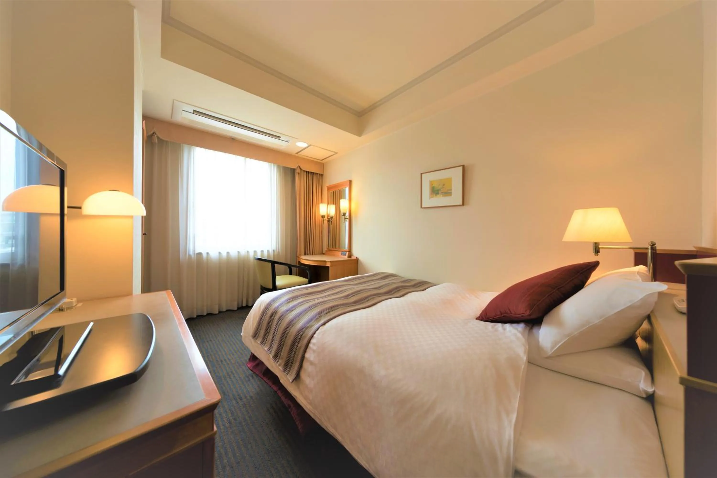 Bed in KKR Hotel Kumamoto