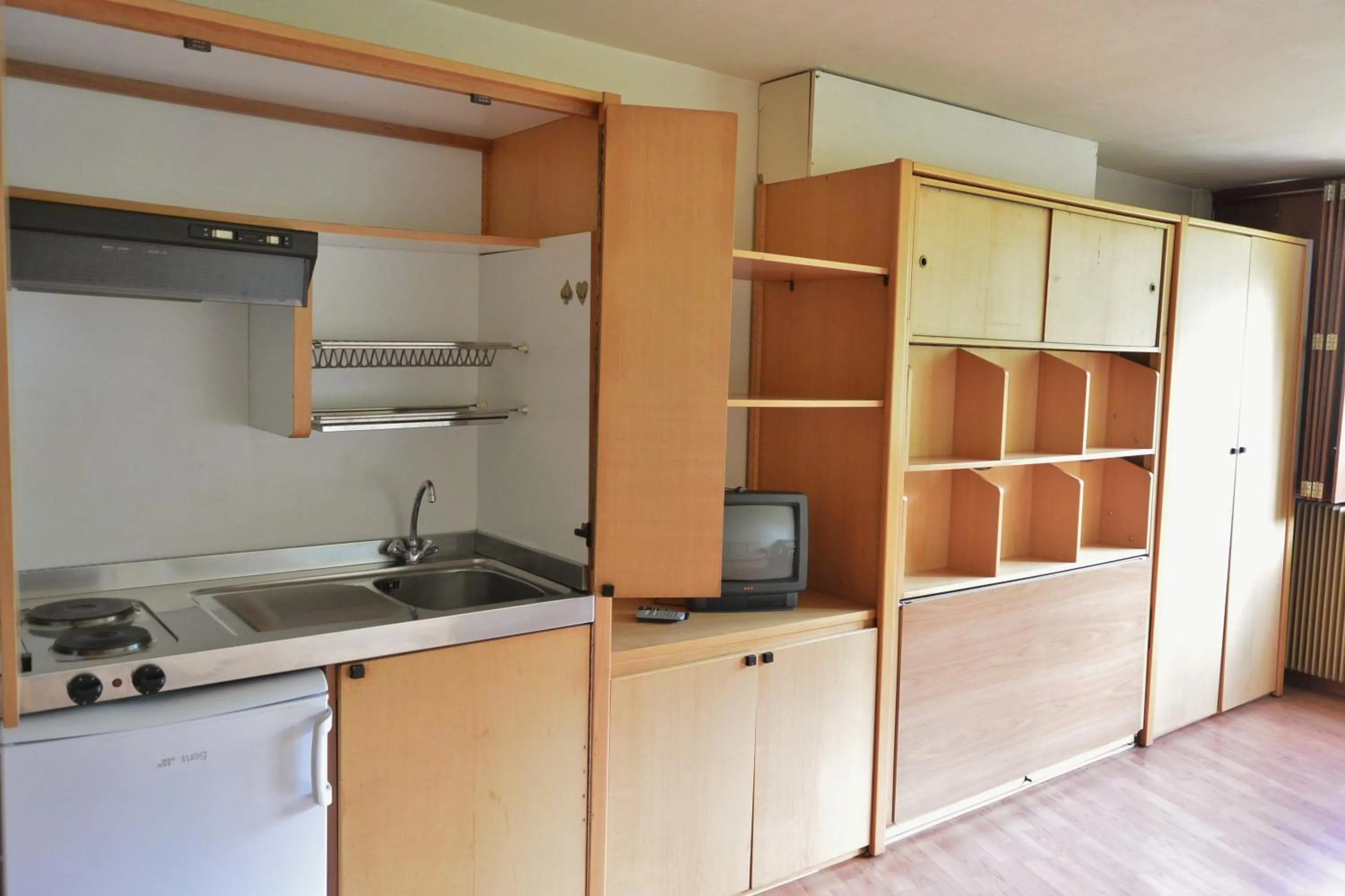 Kitchen or kitchenette in Appartamenti La Maison de Vacances