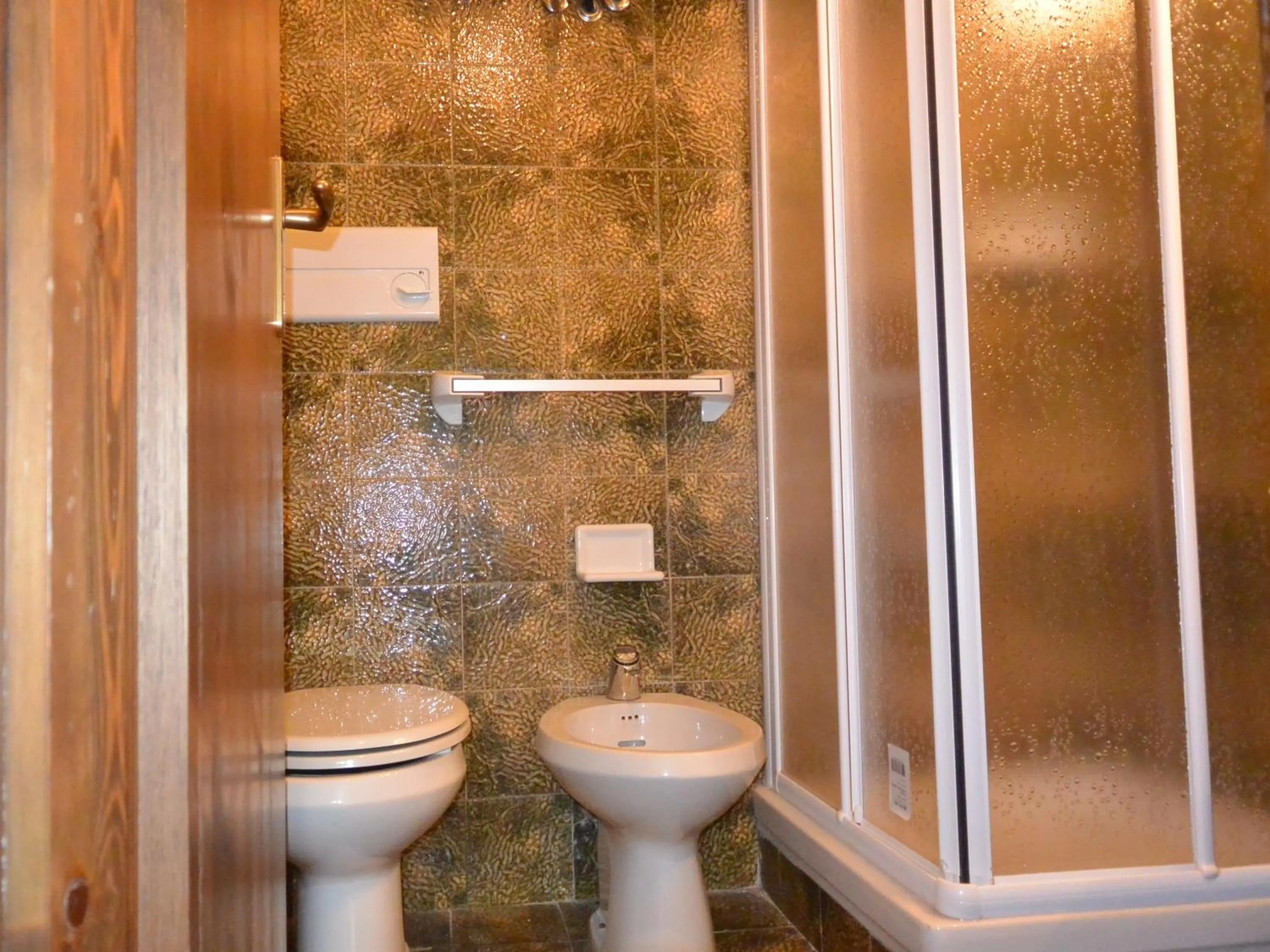 Bathroom in Appartamenti La Maison de Vacances