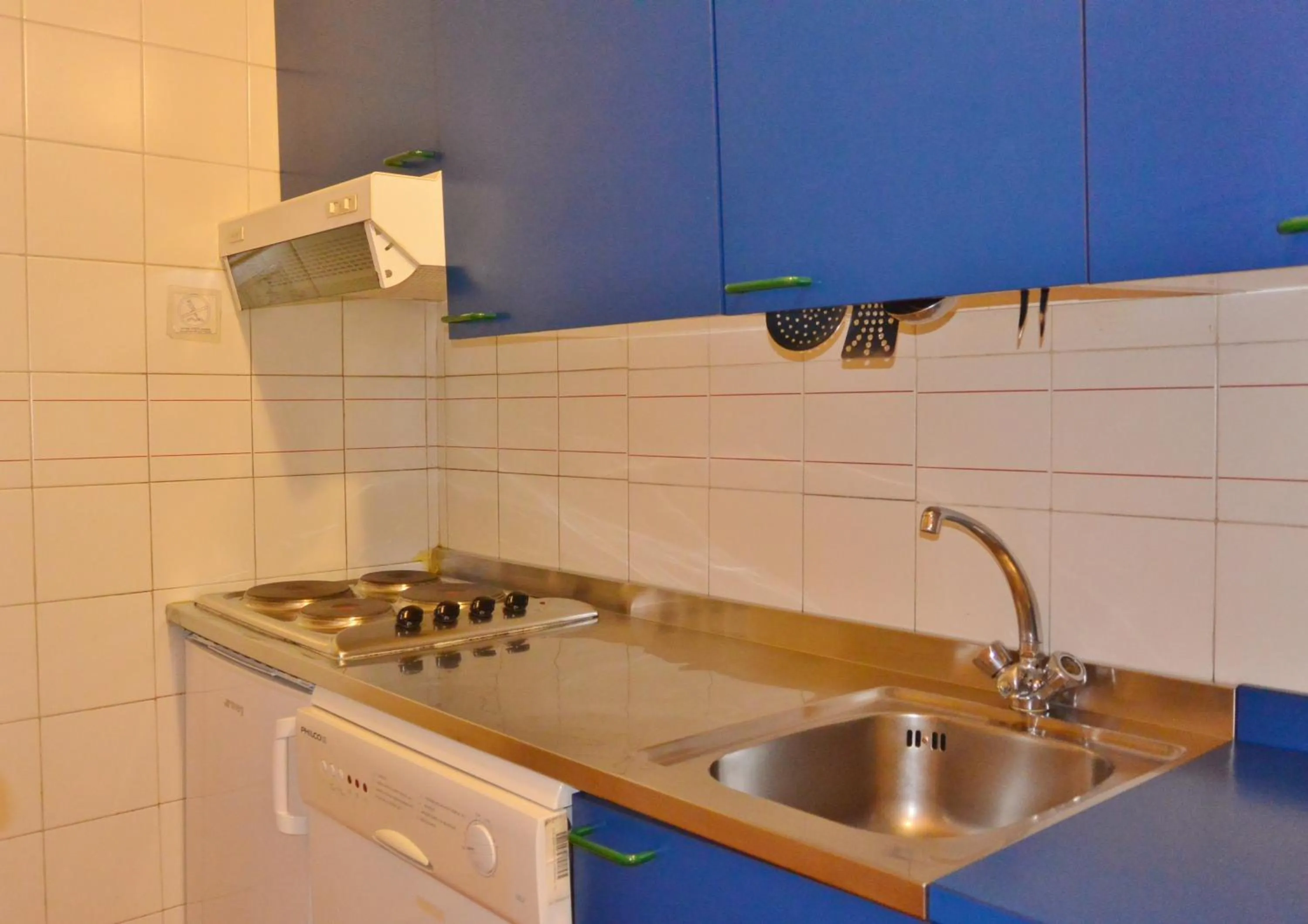 Kitchen or kitchenette in Appartamenti La Maison de Vacances