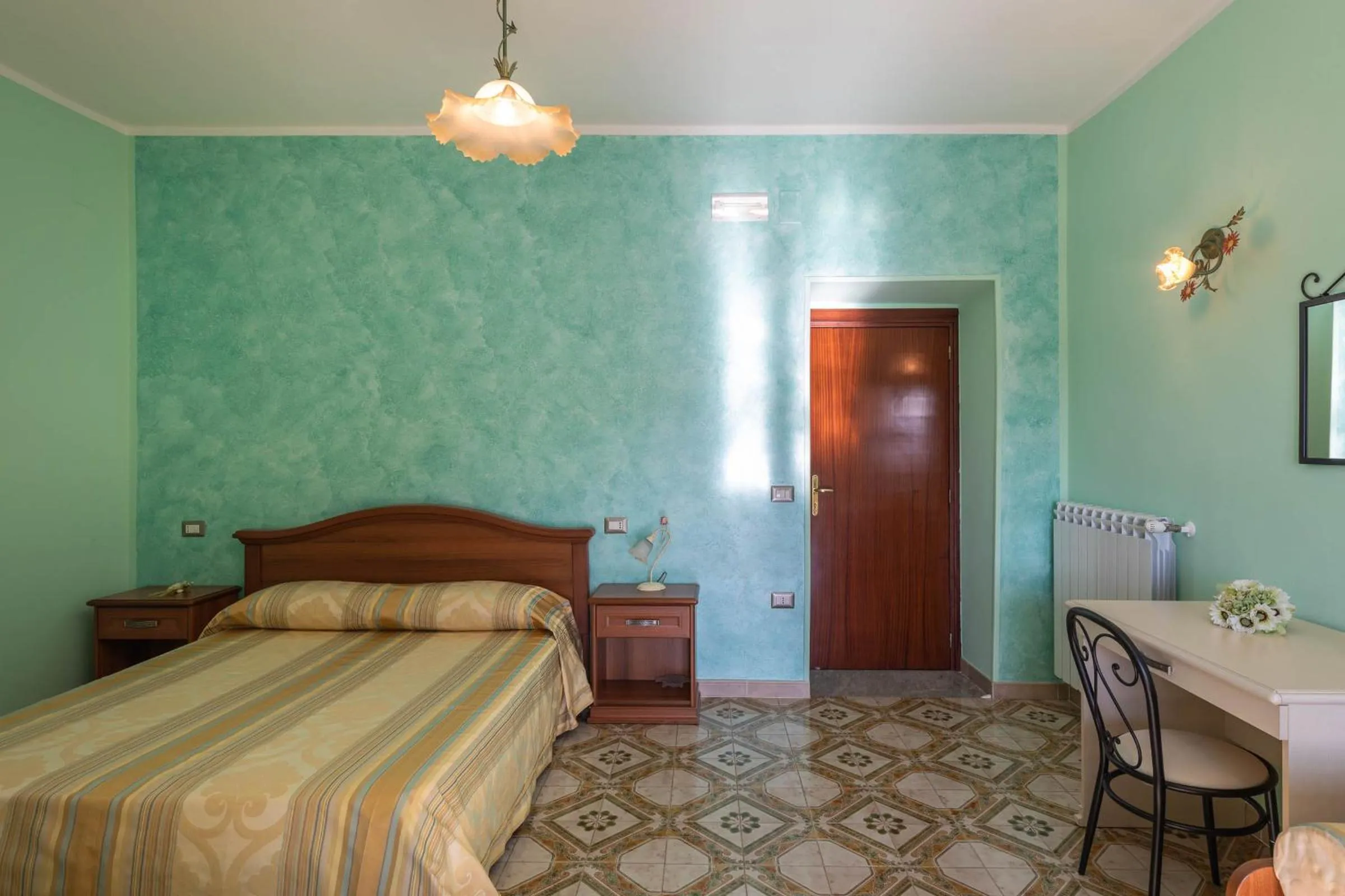 Bed in B&B La Mortella