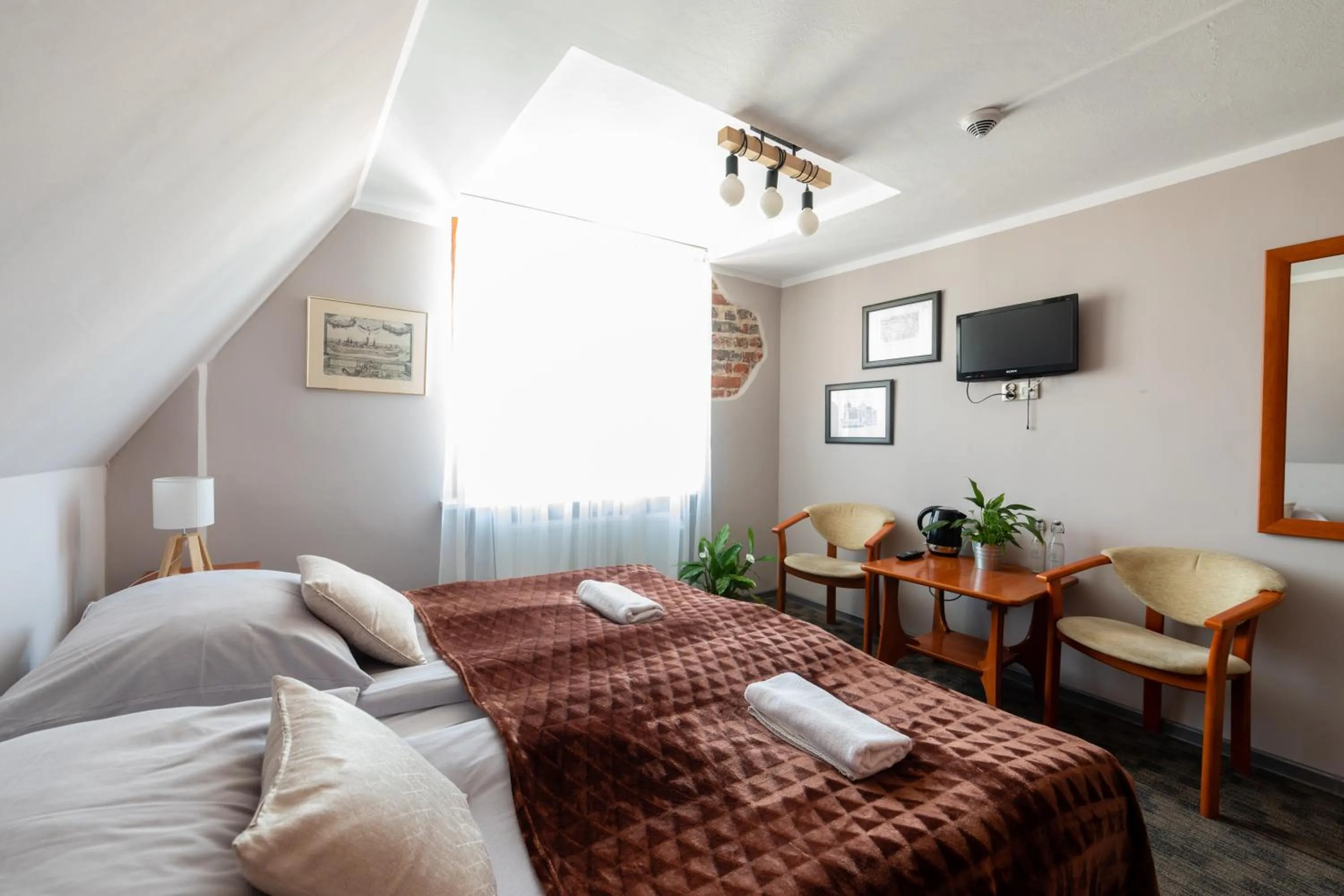 Photo of the whole room, Bed in Dom Zachariasza Zappio