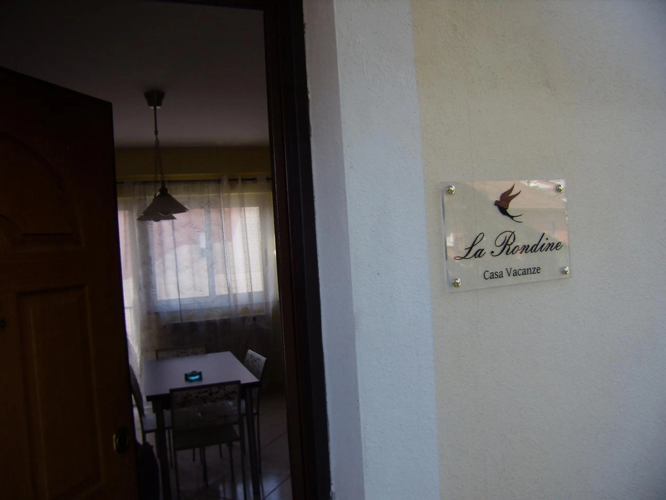 Property logo or sign in Casa Vacanza la Rondine