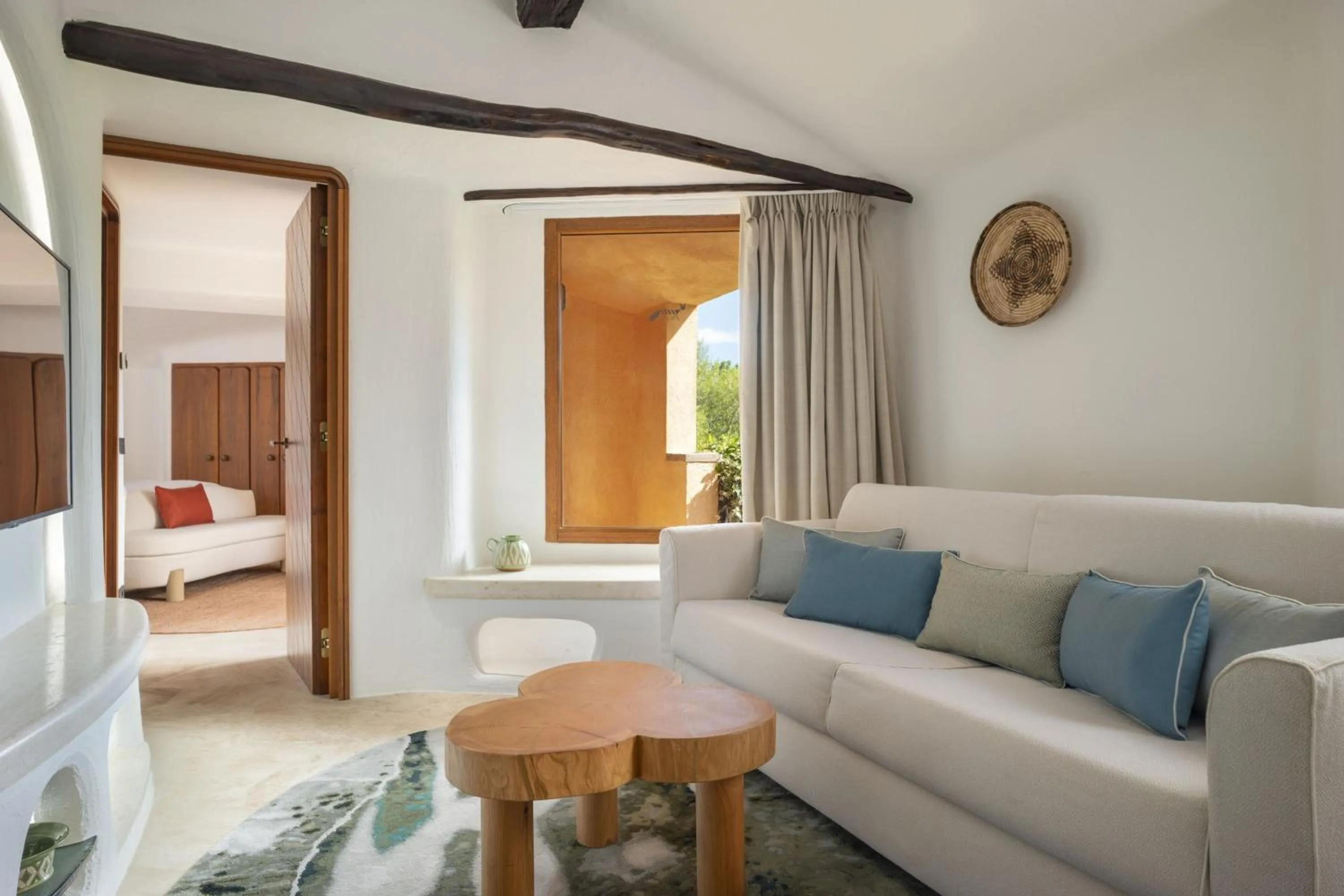 Living room, Bed in Hotel Cala di Volpe, a Luxury Collection Hotel, Costa Smeralda
